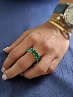 Araya 0.90 Carat Oval Zambian Emerald Classic Infinity Ring in 18 Karat Gold