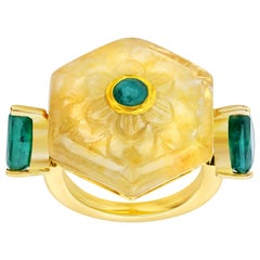 Araya 26.30 Carat Carved Yellow Sapphire and Zambian Emerald Ring