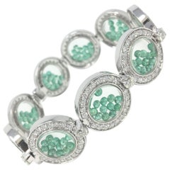 ARAYA Diamond and Floating Emerald Beads Bracelet in 18 Karat White Gold