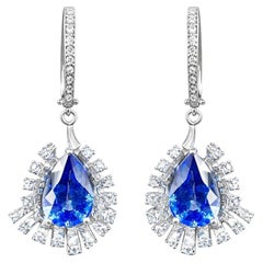 Boucles d'oreilles pendantes ARAYIAN en saphir bleu et diamants, en or blanc 18 carats