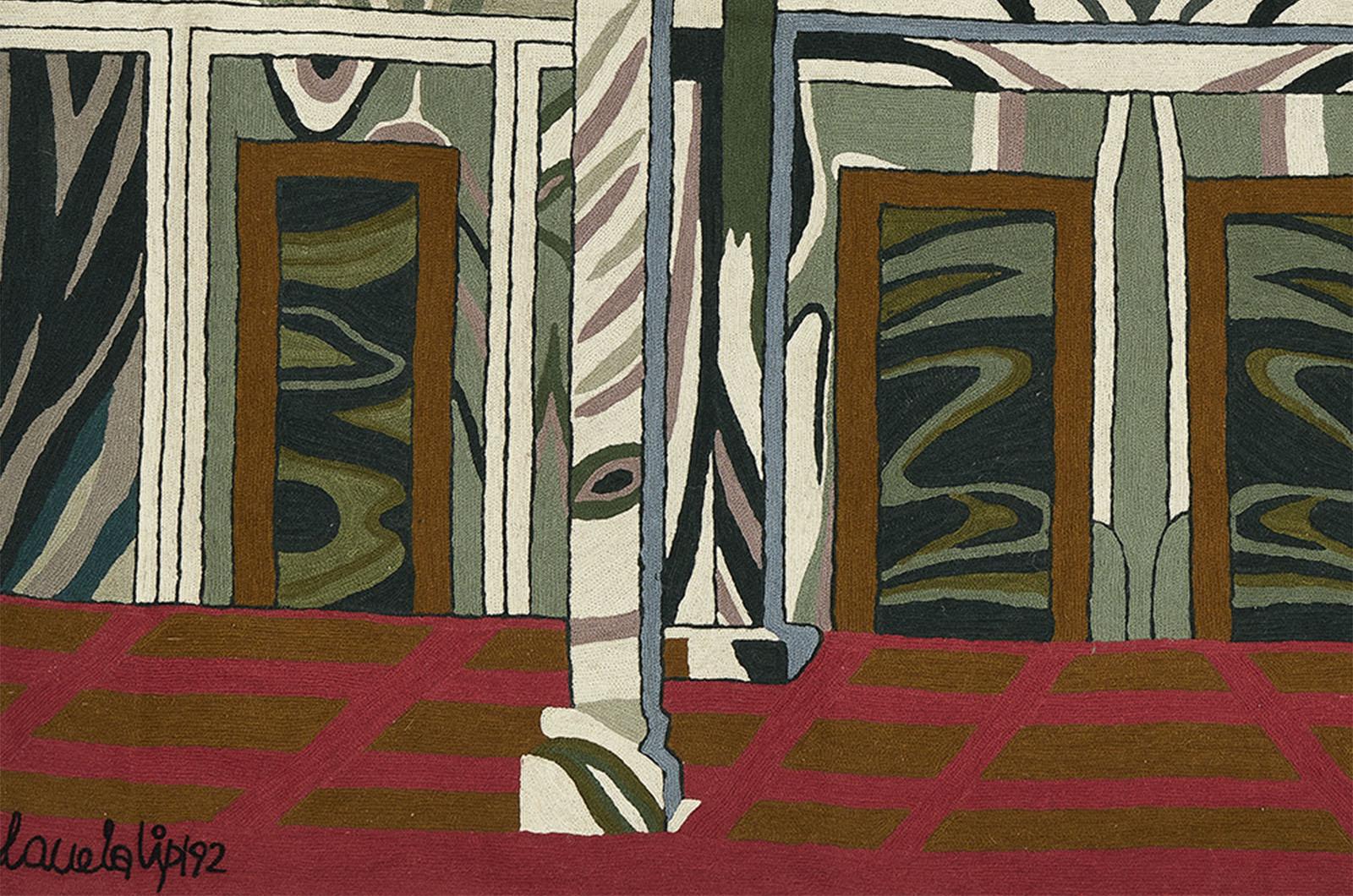 Wall tapestry designed by Nanda Vigo for Flou in 1992. The tapestry is made of hand-knotted wool and depicts architecture. The designer's signature is on the left side. The tapestry comes with a steel bar that can be inserted into the designated