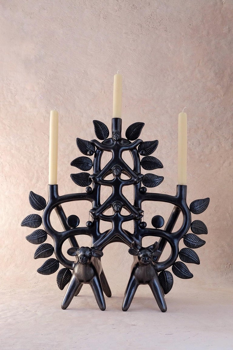 Arbol Acatlán Cirquero Candleholder by Onora
Dimensions: W 60 x D 15 x H 73 cm
Materials: Clay, Quartz stone

Hand sculpted clay, covered with a mineral based slip and burnished using a quartz stone. The “Circo Collection” is a reproduction of