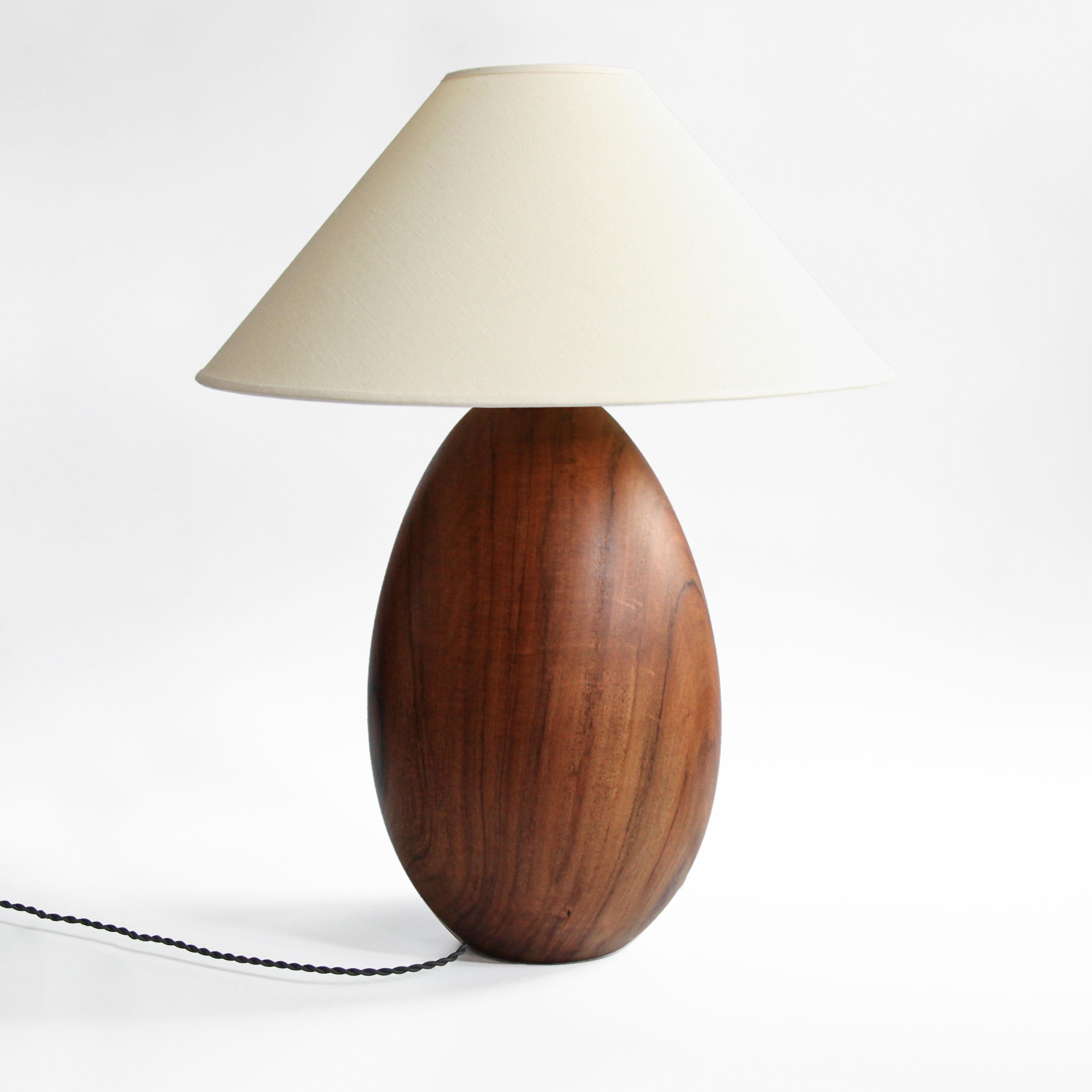 The Árbol collection is an embrace of tropical modernism; each lamp is composed of salvaged tropical hardwoods from the Bolivian city of Santa Cruz, where trees that are felled by natural causes-or for construction-are rescued by our team. A blend
