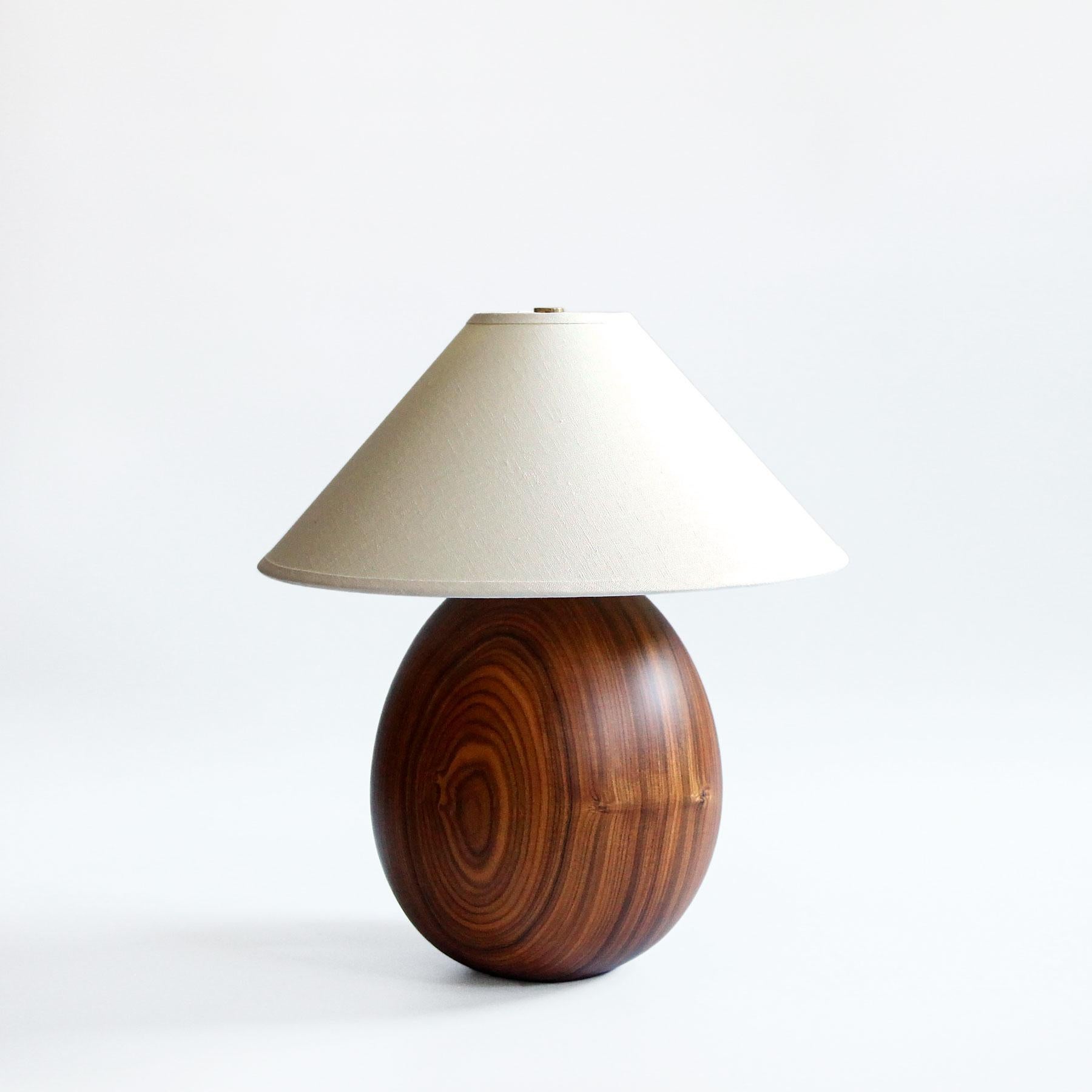 The Árbol collection is an embrace of tropical modernism, each lamp is composed of salvaged tropical hardwoods from the Bolivian city of Santa Cruz, where trees that are felled by natural causes, or for construction, are rescued by our team. A blend