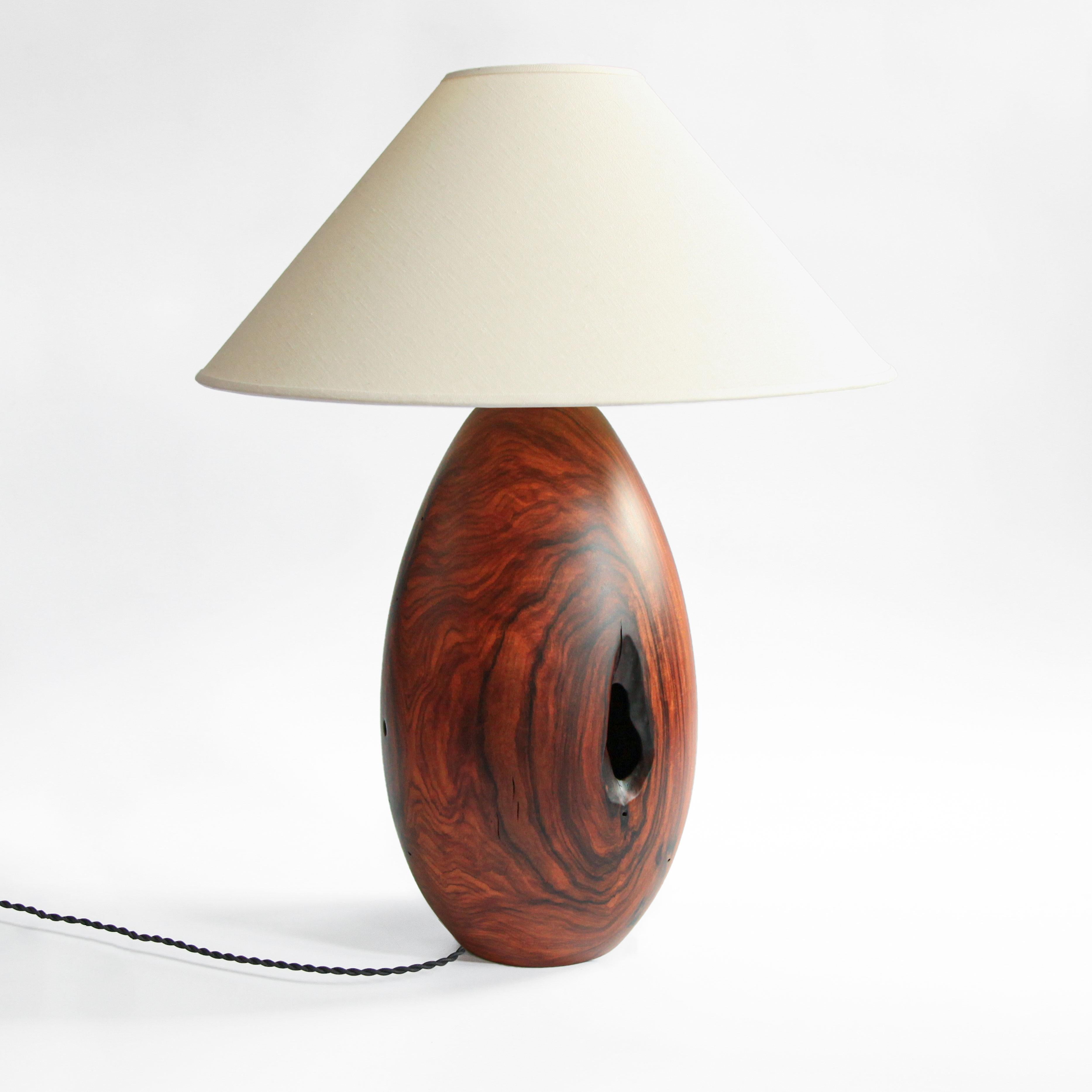 The Árbol collection is an embrace of tropical modernism; each lamp is composed of salvaged tropical hardwoods from the Bolivian city of Santa Cruz, where trees that are felled by natural causes-or for construction-are rescued by our team. A blend