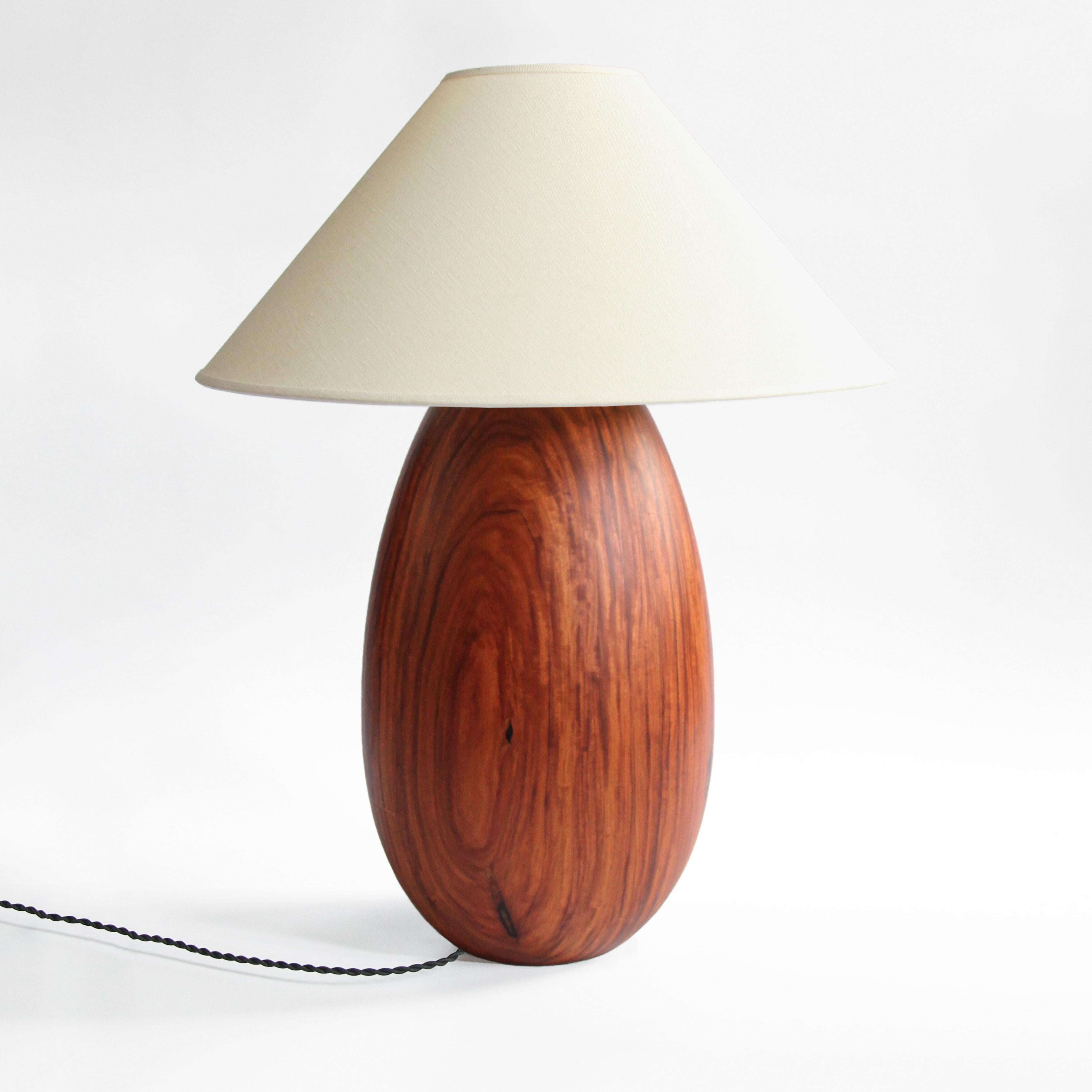 The Árbol collection is an embrace of tropical modernism; each lamp is composed of salvaged tropical hardwoods from the Bolivian city of Santa Cruz, where trees that are felled by natural causes, or for construction, are rescued by our team. A blend