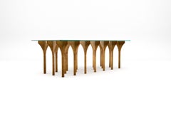 Arc Coffee Table - Modern Handcrafted Table in Patinated Brass with Glass Top