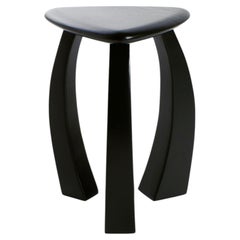 handmade Arc de Stool '52 in solid wood black varnish, curved legs