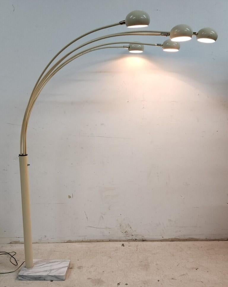 Offering one of our recent palm beach estate fine lighting acquisitions of a
1970s Italian 5 light Arc floor lamp
Finish is enameled, color is a kind of taupe, has 3 settings-5 lights on, 3 lights on, or 2 lights on, and it has a new