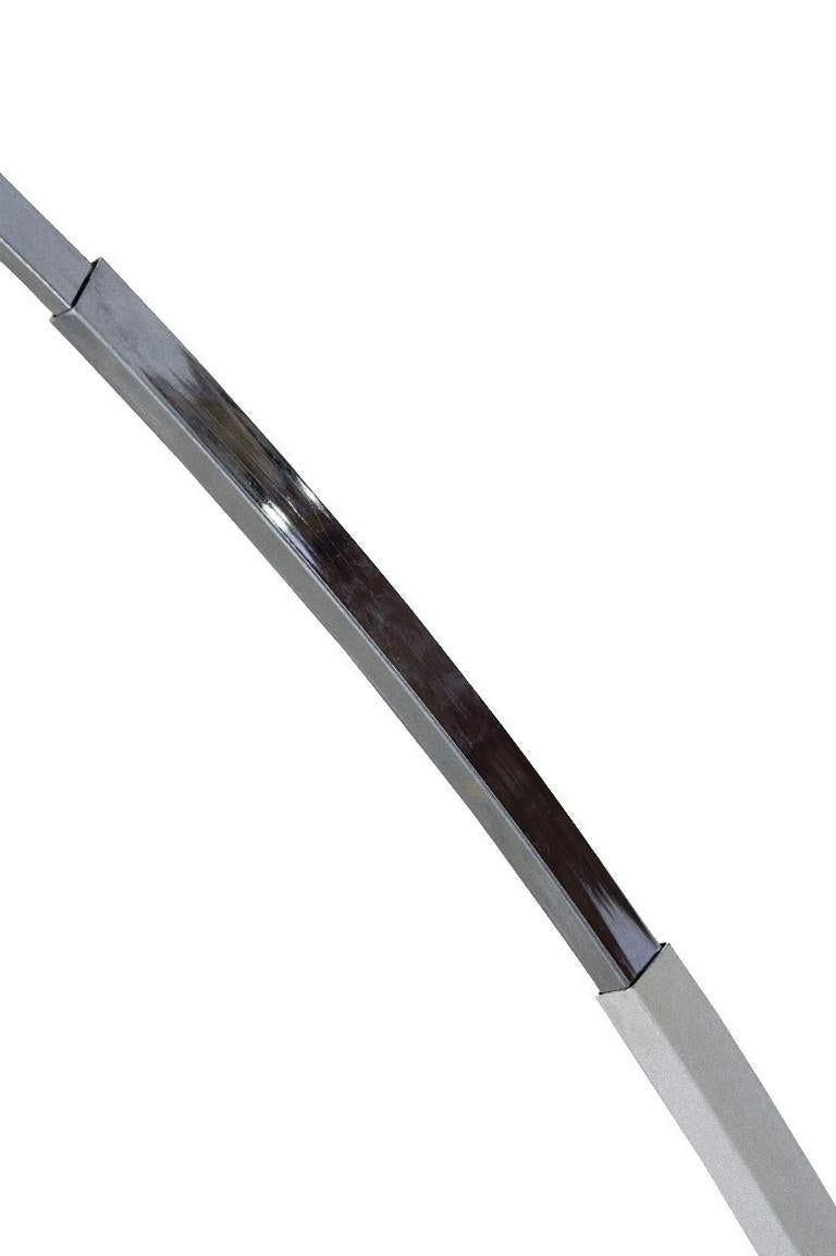 This Arc Lamp is an original design lamp realized by Fabio Lenci during the 1970s.

Original lamp in steel and plexiglass with a retractable arm.

An arc lamp is a type of lamp which produces light by an arc between metal electrodes through an