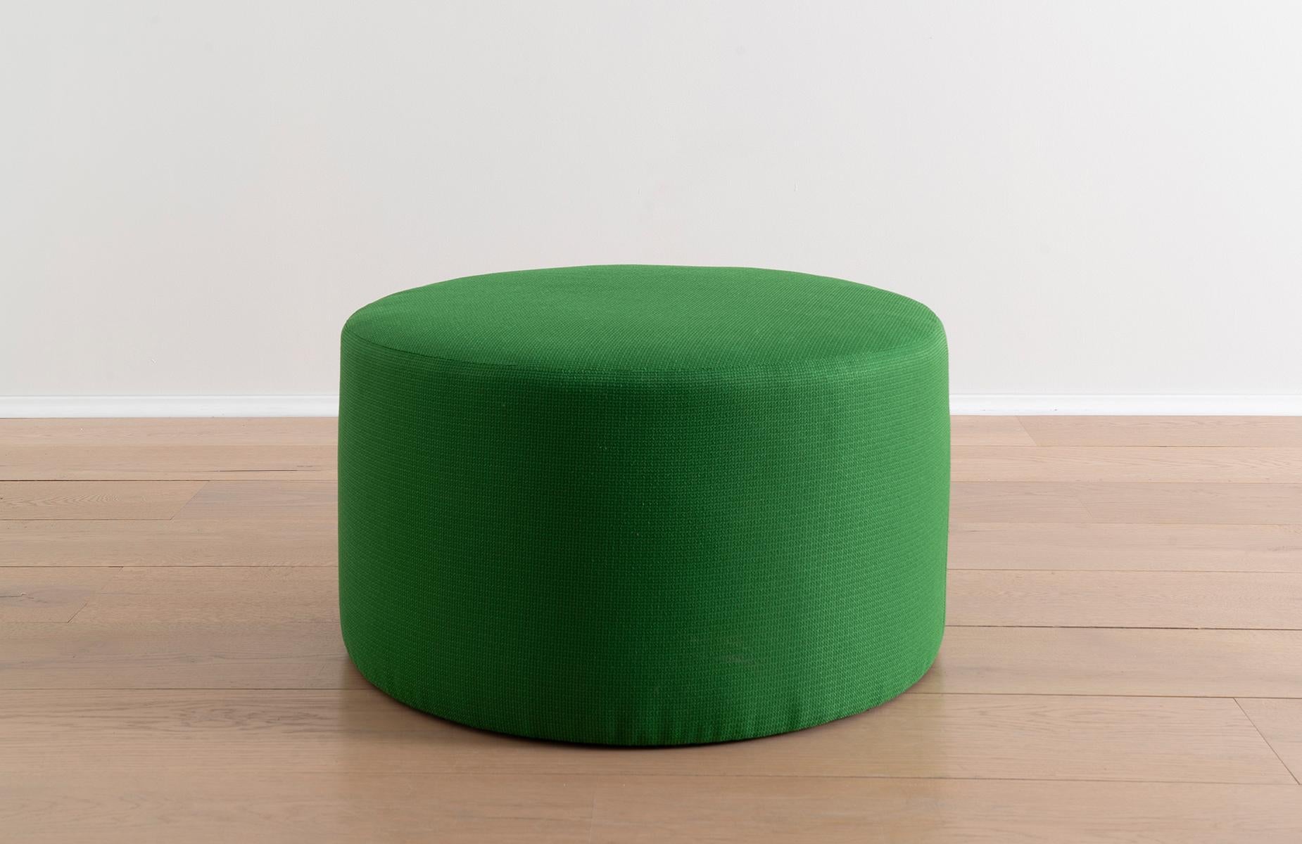 This green ottoman pairs well with just about any sofa or lounge chair, while also offering versatility as a pouf, coffee or side table. Invite both color and a functional upgrade into any seating arrangement with this sculptural study in