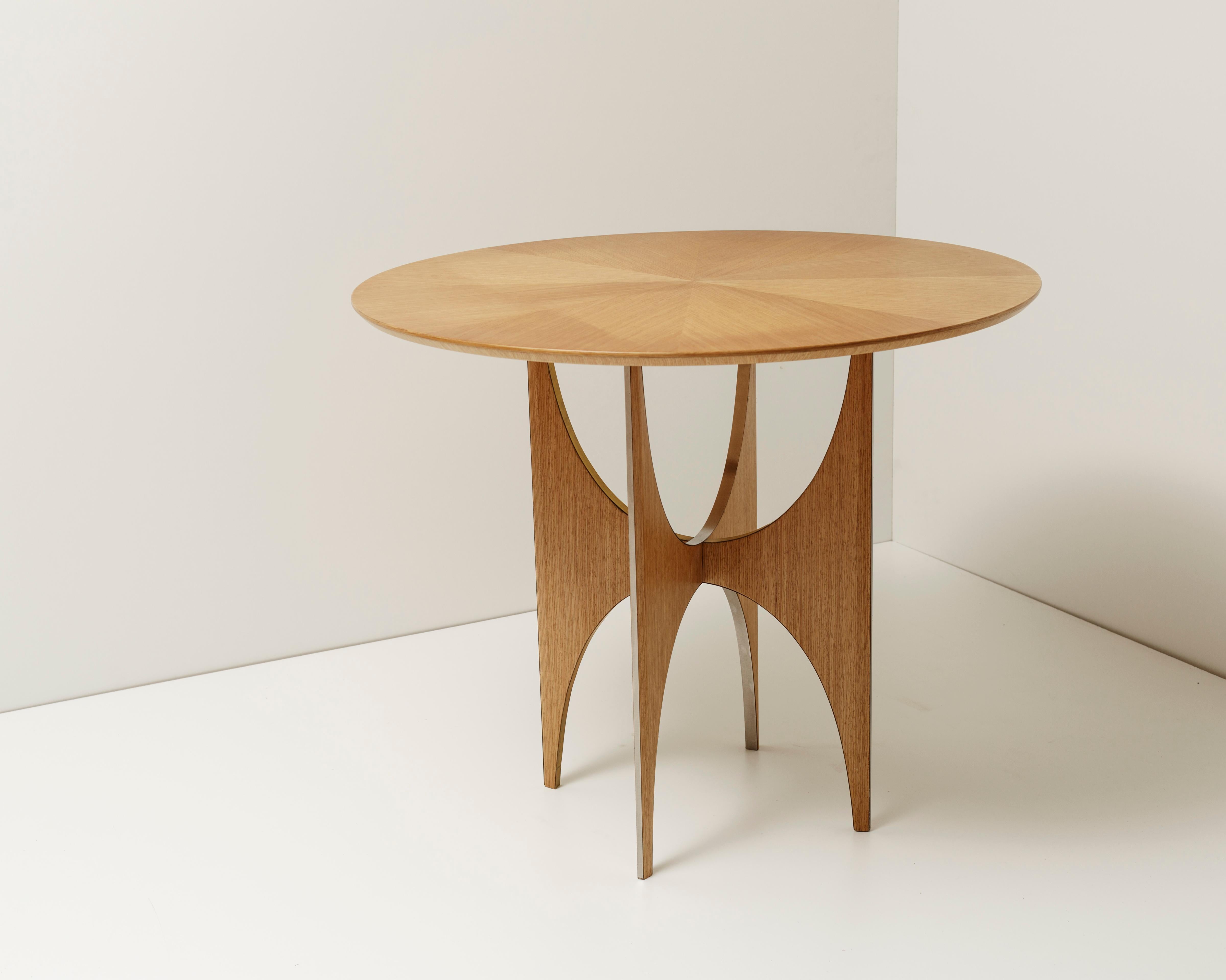 Arc round coffee table by Ana Volante Studio
The Moon Collection
Dimensions: Ø 90 x H 75 cm
Materials: Oakwood, rose wood, stainless steel and brass

Ana Volante, founder of Ana Volante Studio, is a Venezuelan designer specialized in interior