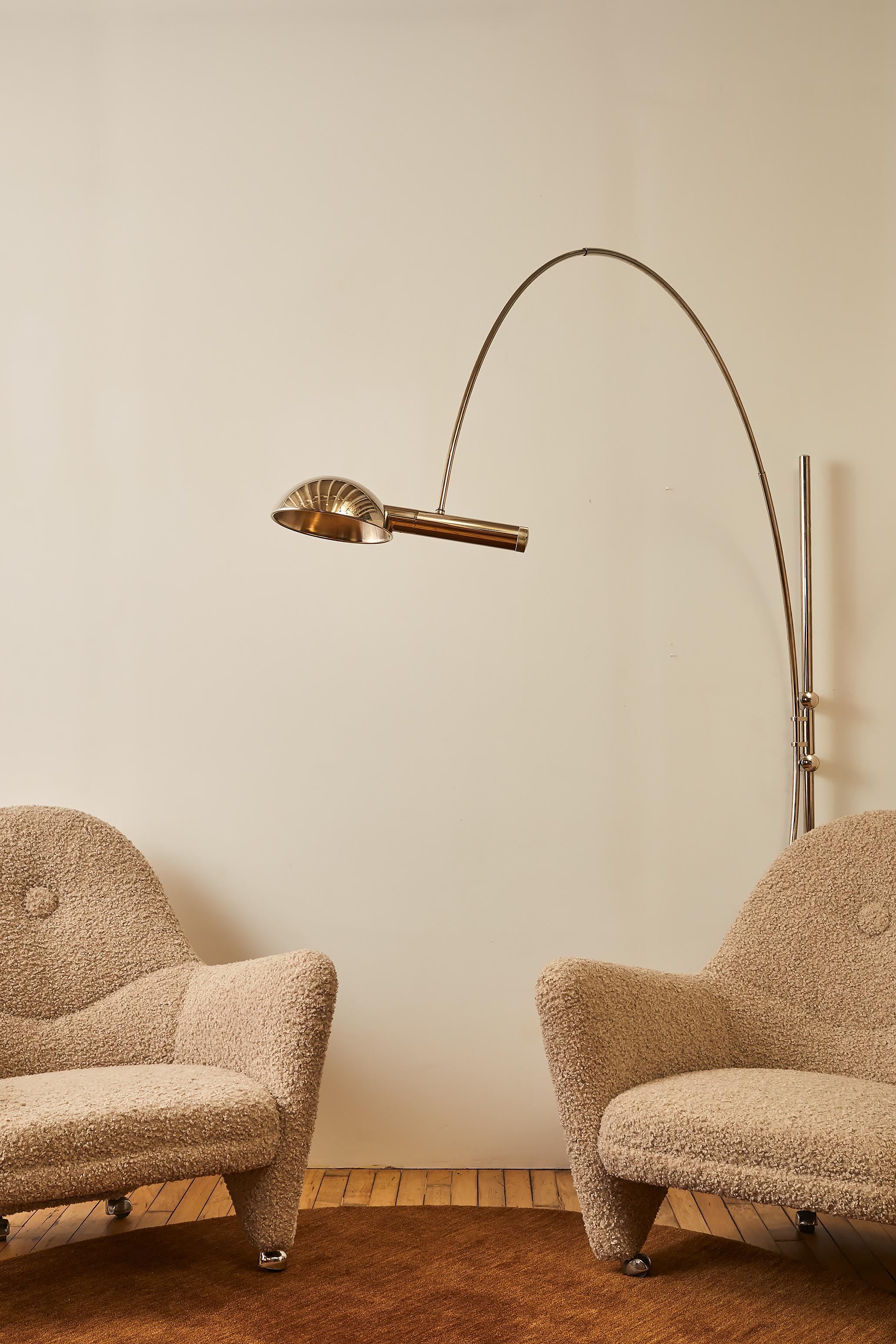 Arc wall lamp by Florian Schulz with a chrome finish. 

     