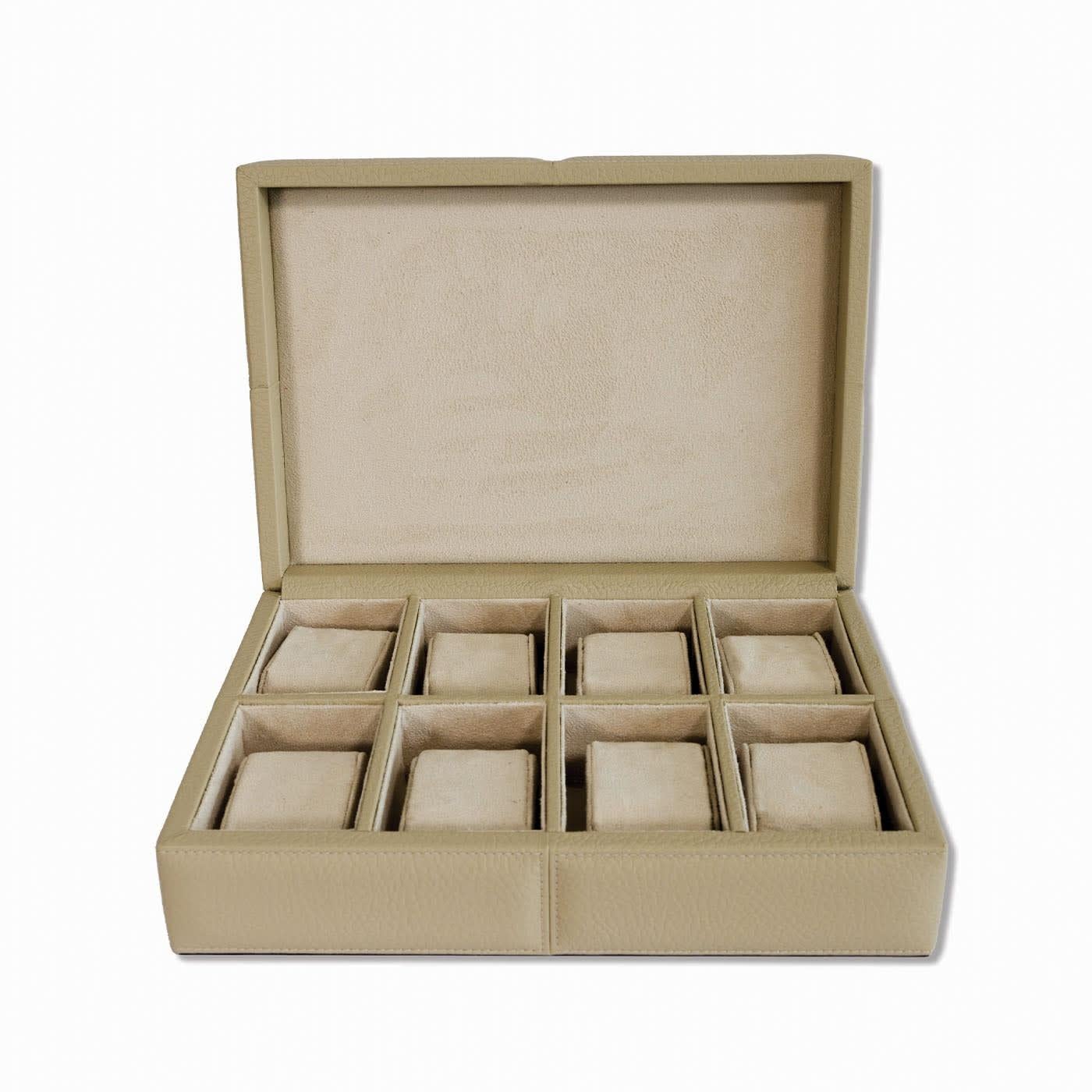 Wooden handmade box, with plateau, dressed in fine and soft genuine leather and with decorative soft stitching. Available in 14 different colors. Please, ask the Concierge for further details.