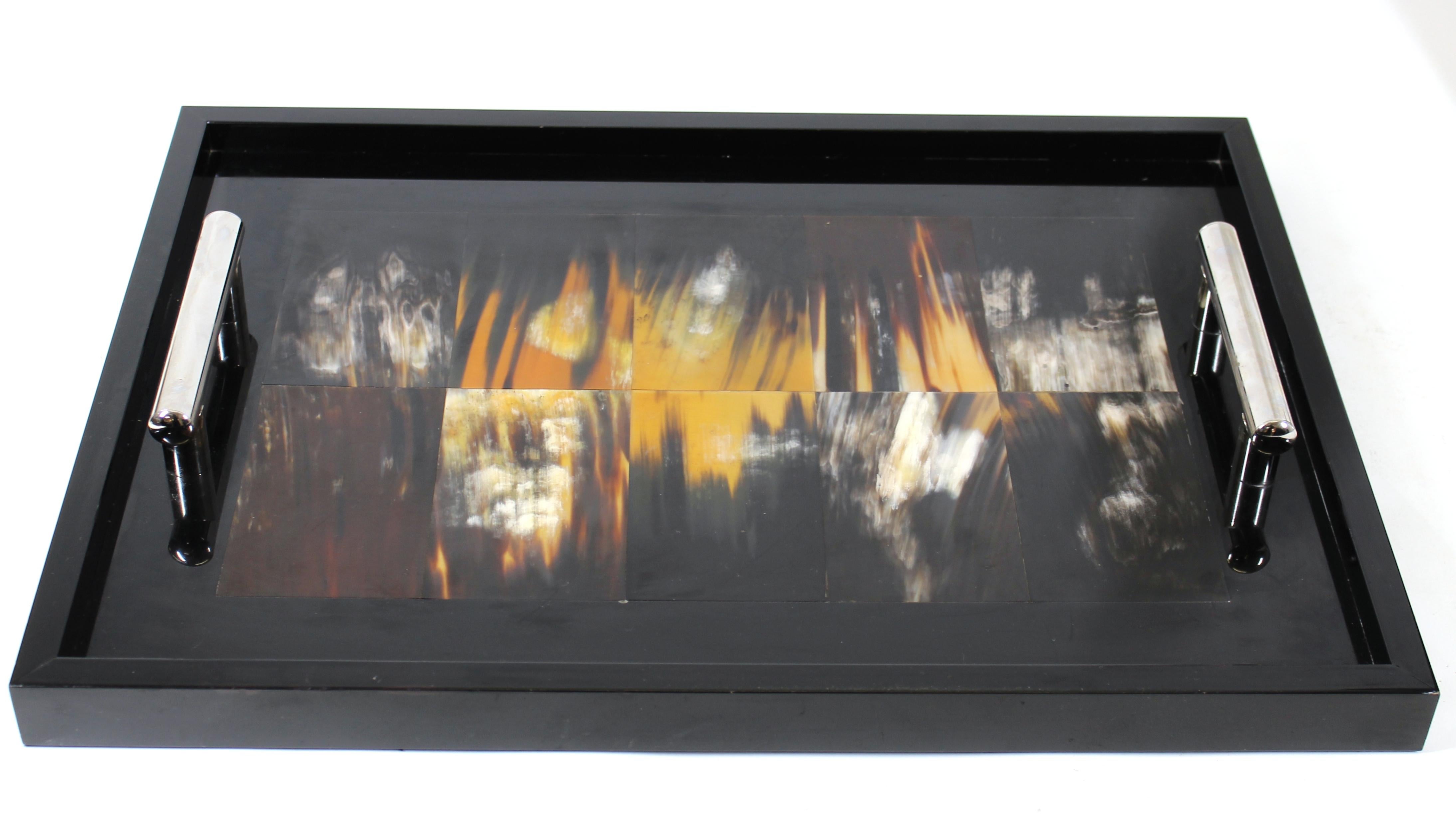 ARCA modern Italian serving tray with inlaid horn in high gloss and two metal handles. Makers mark on the leather bottom.