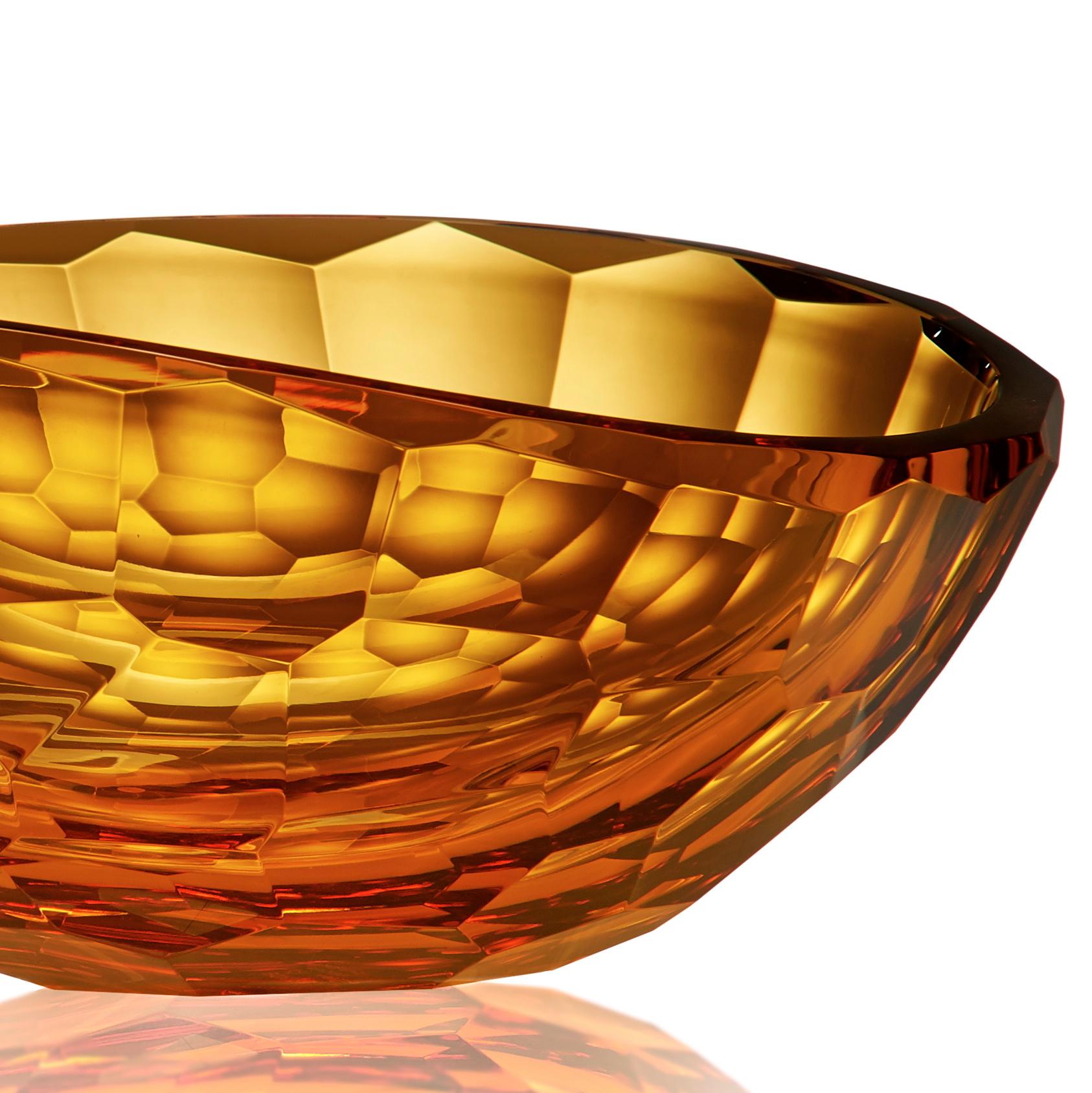 Venus is a mouth, blown and hand shaped bowl in amber color, brilliant cut.
Edition of 33 unique pieces signed and numbered by Ivan Baj. Arcade art pieces are made by hand in our Murano atelier. Small differences of size or color are the best