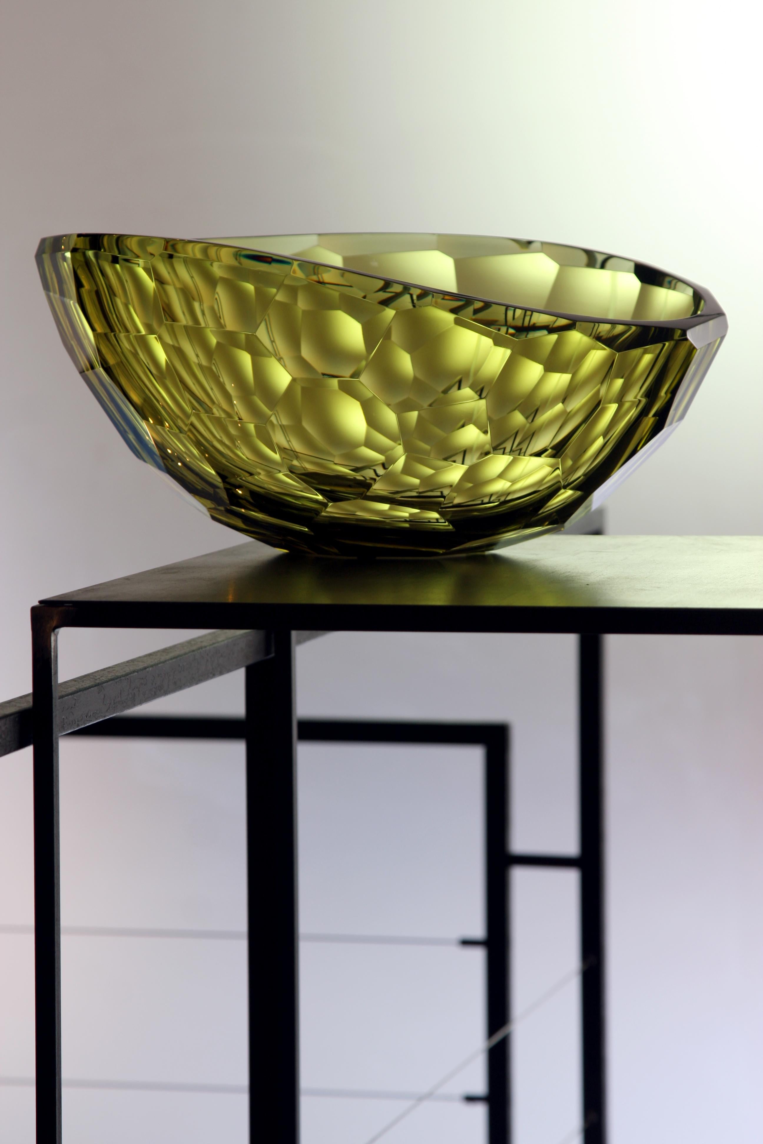 Venus is a mouth, blown and hand shaped bowl in olive color, brilliant cut.
Edition of 33 unique pieces signed and numbered by Ivan Baj. Arcade art pieces are made by hand in our Murano atelier. Small differences of size or color are the best