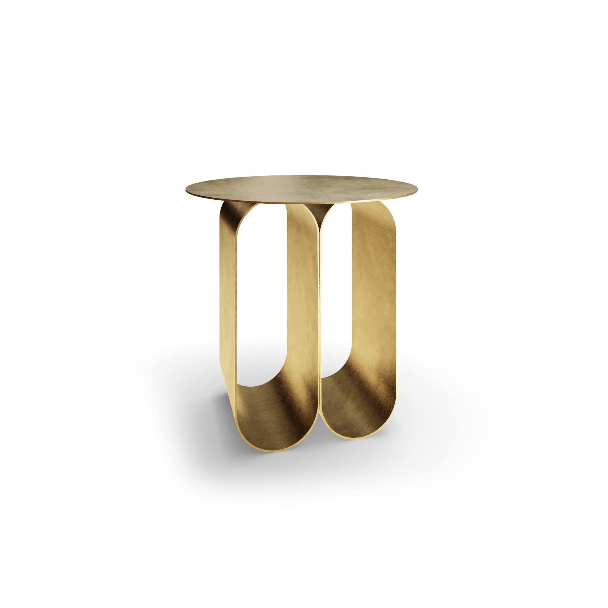 The Arcade coffee table - 2 arches round version - gold, has been created By Kasadamo in collaboration with Pierre Tassin, french designer. This table reflects a mix between old and futuristic architecture. Its identity is found in the arched legs,