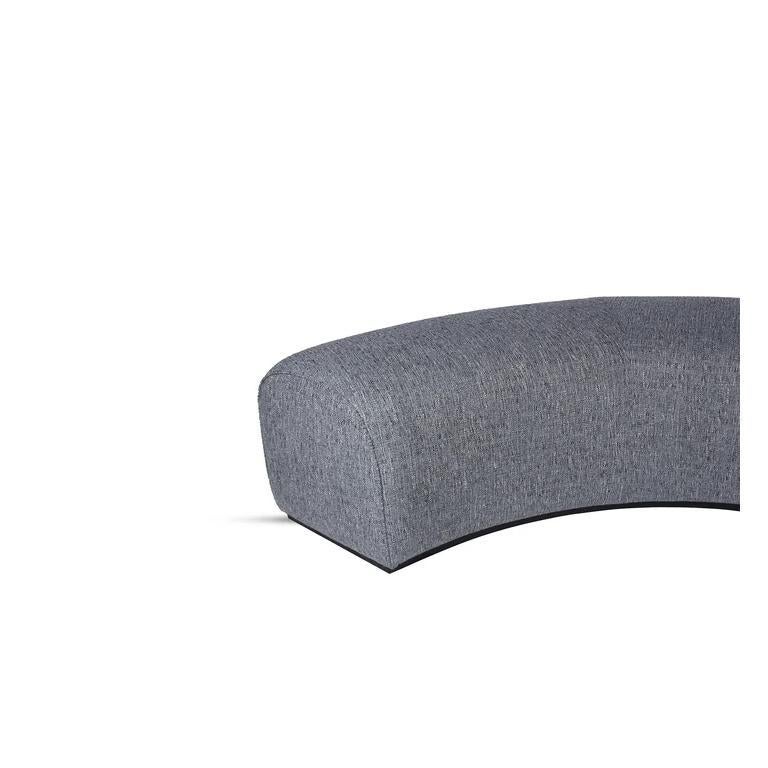 The Arcadia Curved Ottoman redefines comfort and style with its fluid form and plush seating. Designed for modern and luxurious interiors, this ottoman boasts a sculptural silhouette that effortlessly enhances any space. Its elegantly curved shape