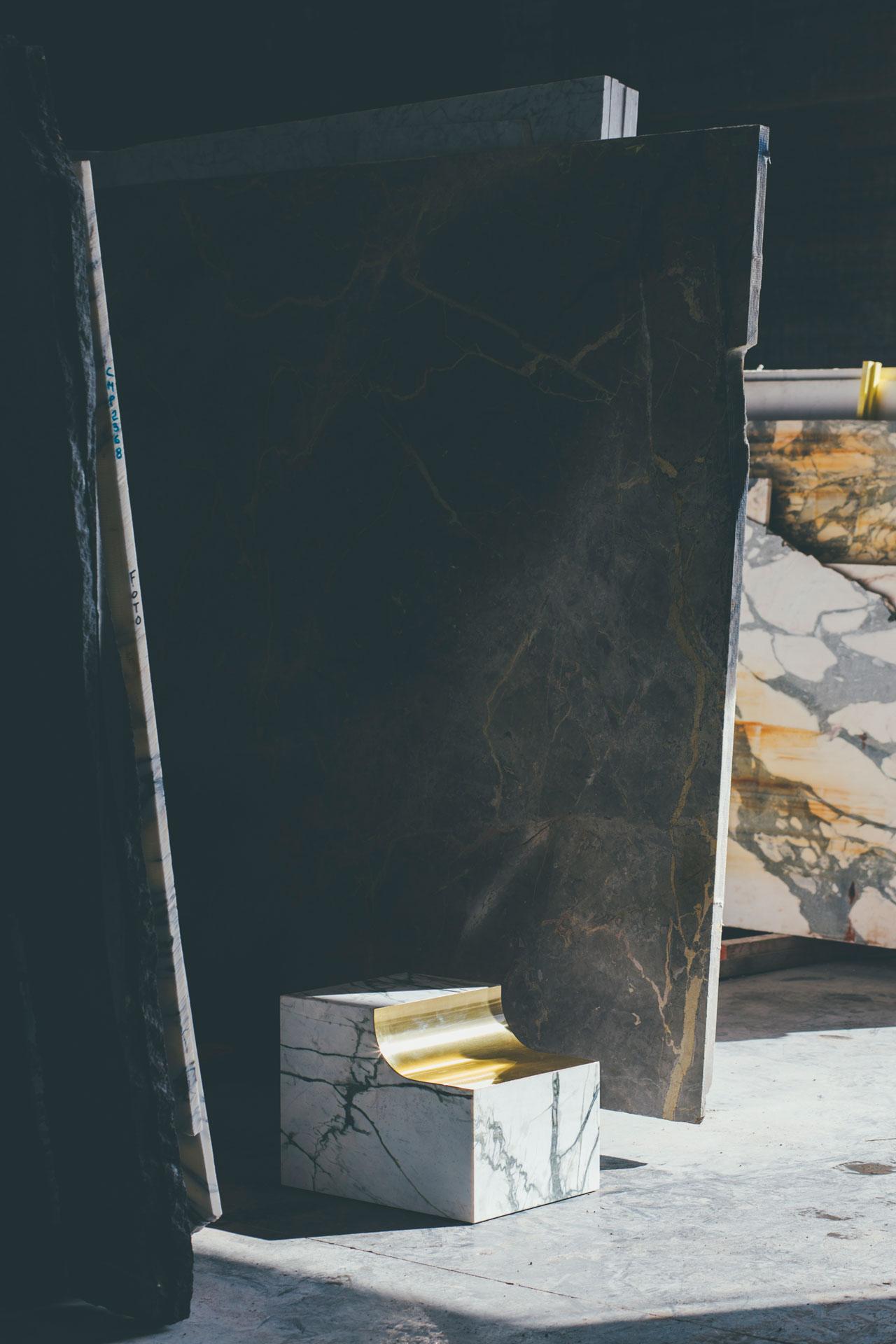 arch 01.1 c is a stool or side table. Its strong design language sets arch 01.1 c apart. 
The marble object is beautifully finished with a metal surface. Brass giving it a pop of gold. 
Without an obvious front, back, top or bottom, the object can