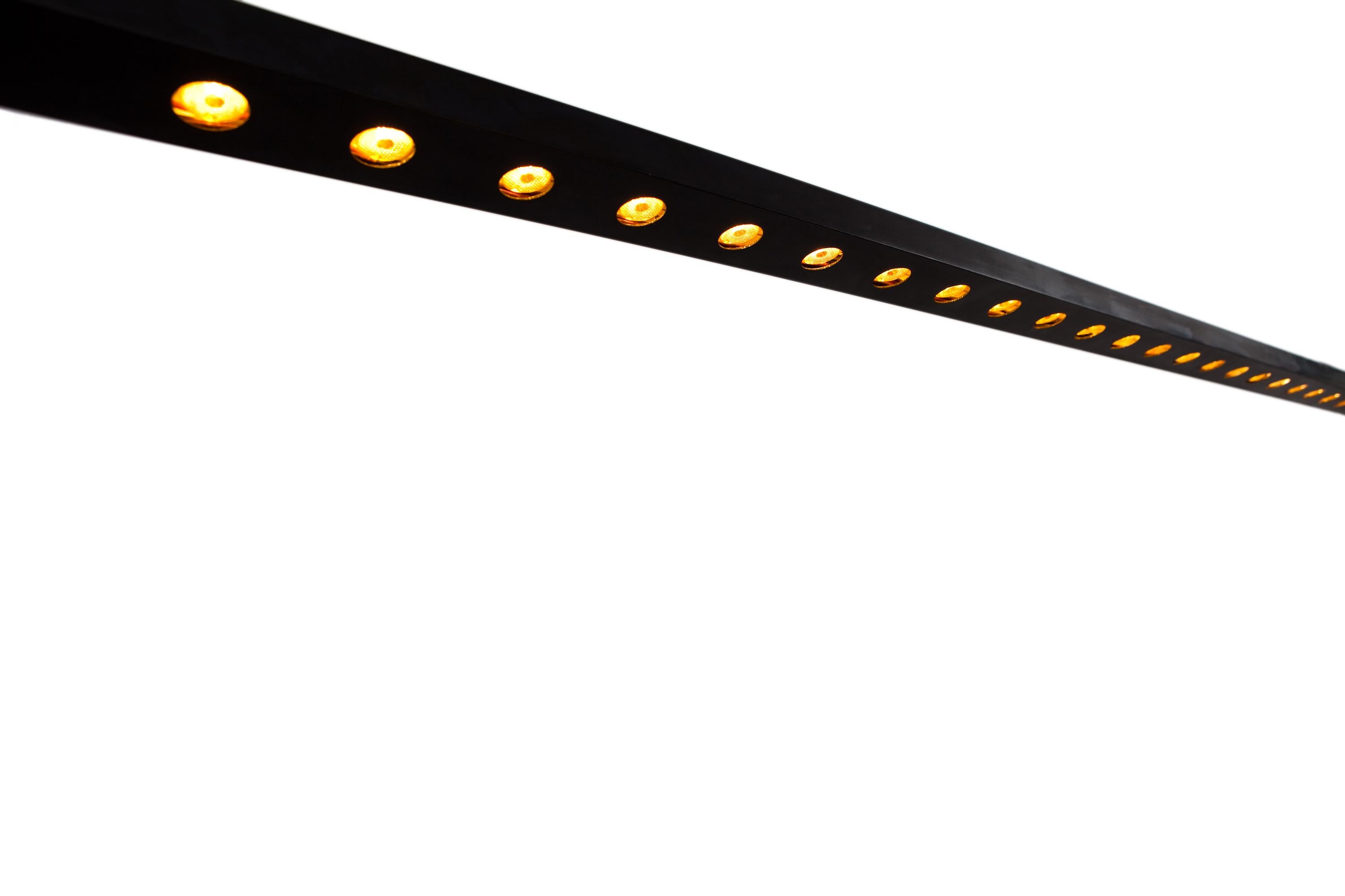 The arch is a dark chemical colored lighting fixture with led lights and lenses, driver and dimmer not included in the fixture. It has to be provided outside of the armature.