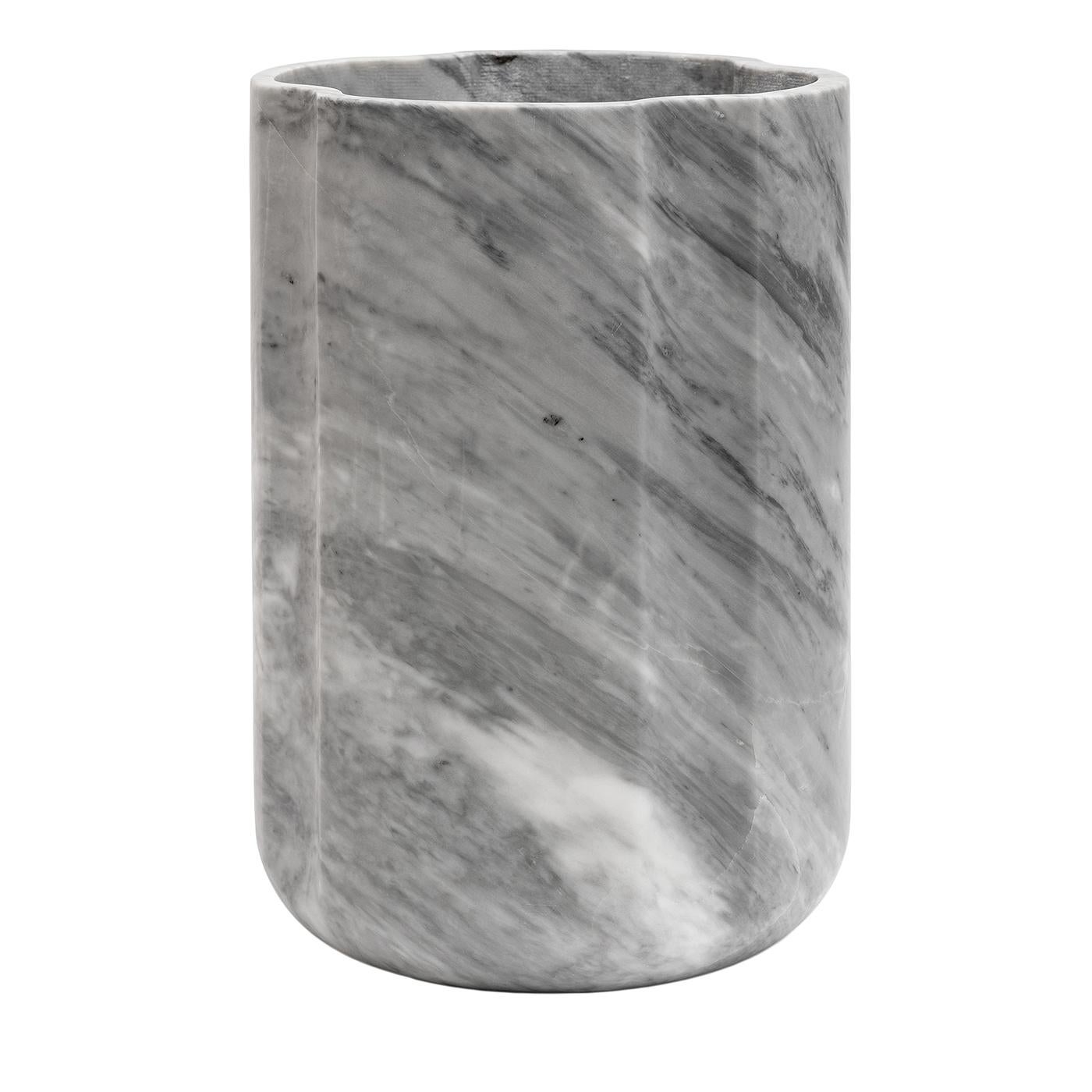 Part of a refined statuary collection of home objects, the Arch vase by Piet Boon features a sculptural form that highlights the unique qualities of Bardiglio Nuvolato marble. Its design balances function and aesthetics, bringing character and