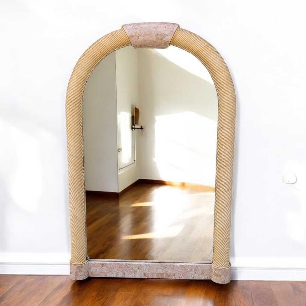 A distinctive arch mirror in the postmodern 1980s tradition, crafted from tessellated stone and showcasing sculptural rattan rope detailing. This piece blends timeless design with quality craftsmanship—ideal for an entryway, bedroom, or statement