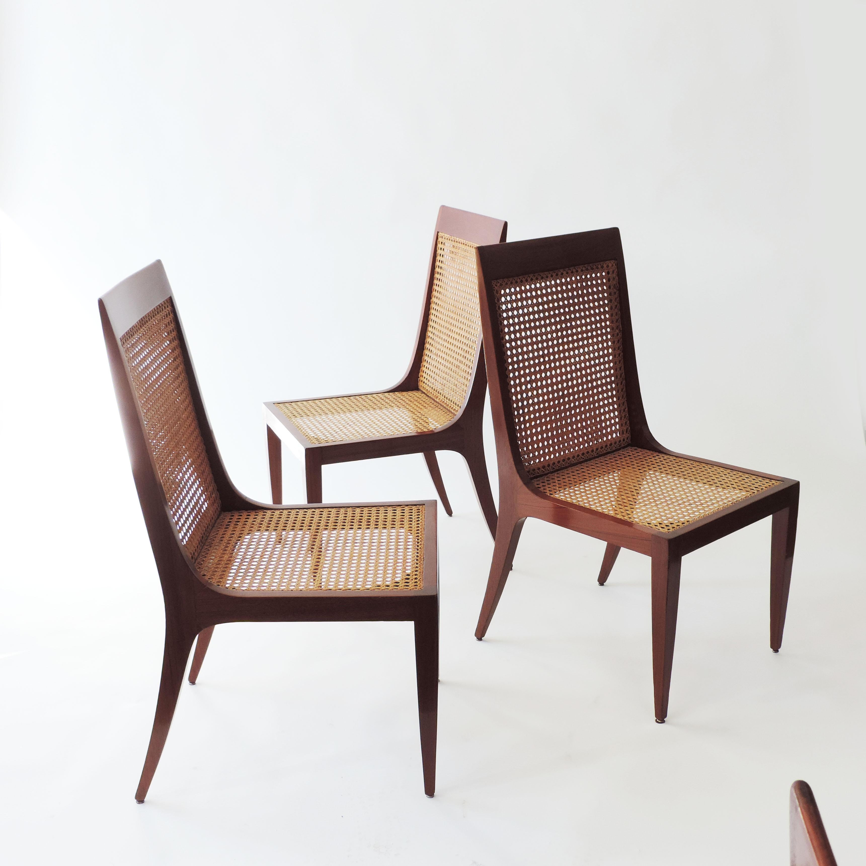 Arch. Paolo Buffa set of six dining chairs.
Wood and original double-sided wicker.