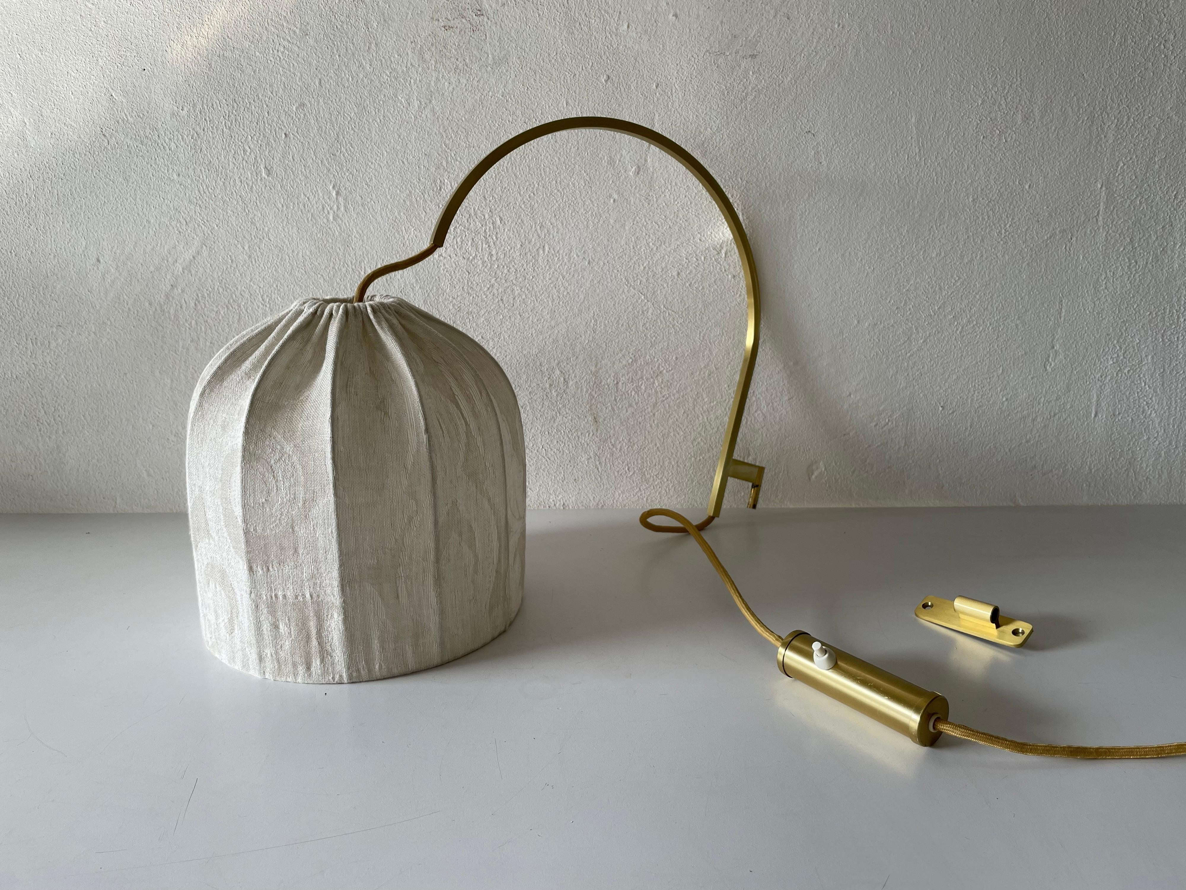 Very rare large Arch shaped brass body with fabric shade wall lamp by WKR Leuchten, 1970s Germany

Sculptural very elegant rare heavy wall lamp. 

It is very ideal and suitable for all living areas.

Lamp is in good condition. No damage, no
