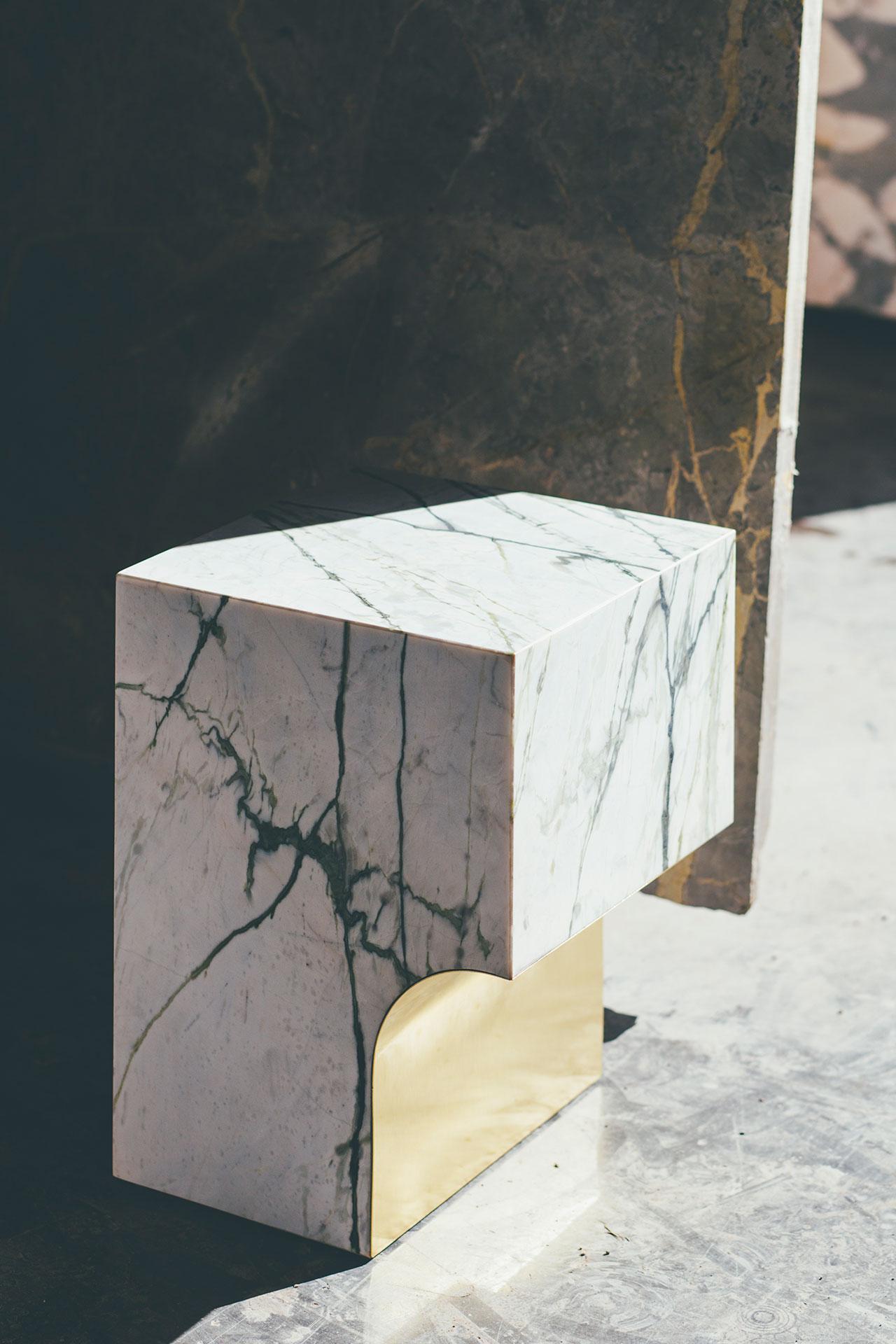Arch side table by Sam Goyvaerts
Dimensions: 45 x 34 x 34 cm
Marble and brass.

Its strong design language sets arch 01.1 c apart. The marble object is beautifully fnished with a metal surface. Brass giving it a pop of gold or
stainless steel