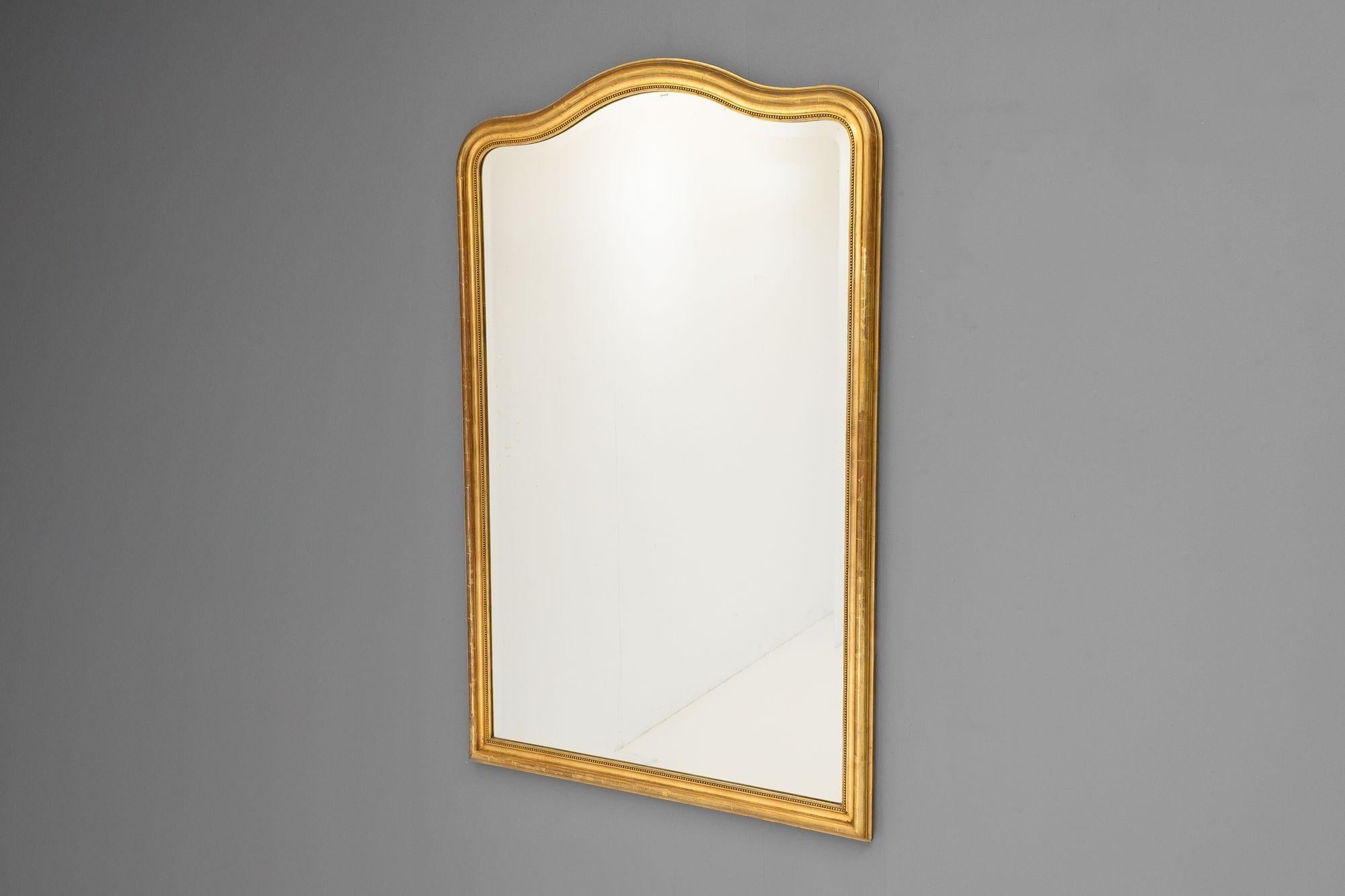 French gilded arch top mirror with original plate. Circa 1880.


H 162cm x W 101cm x D 5cm