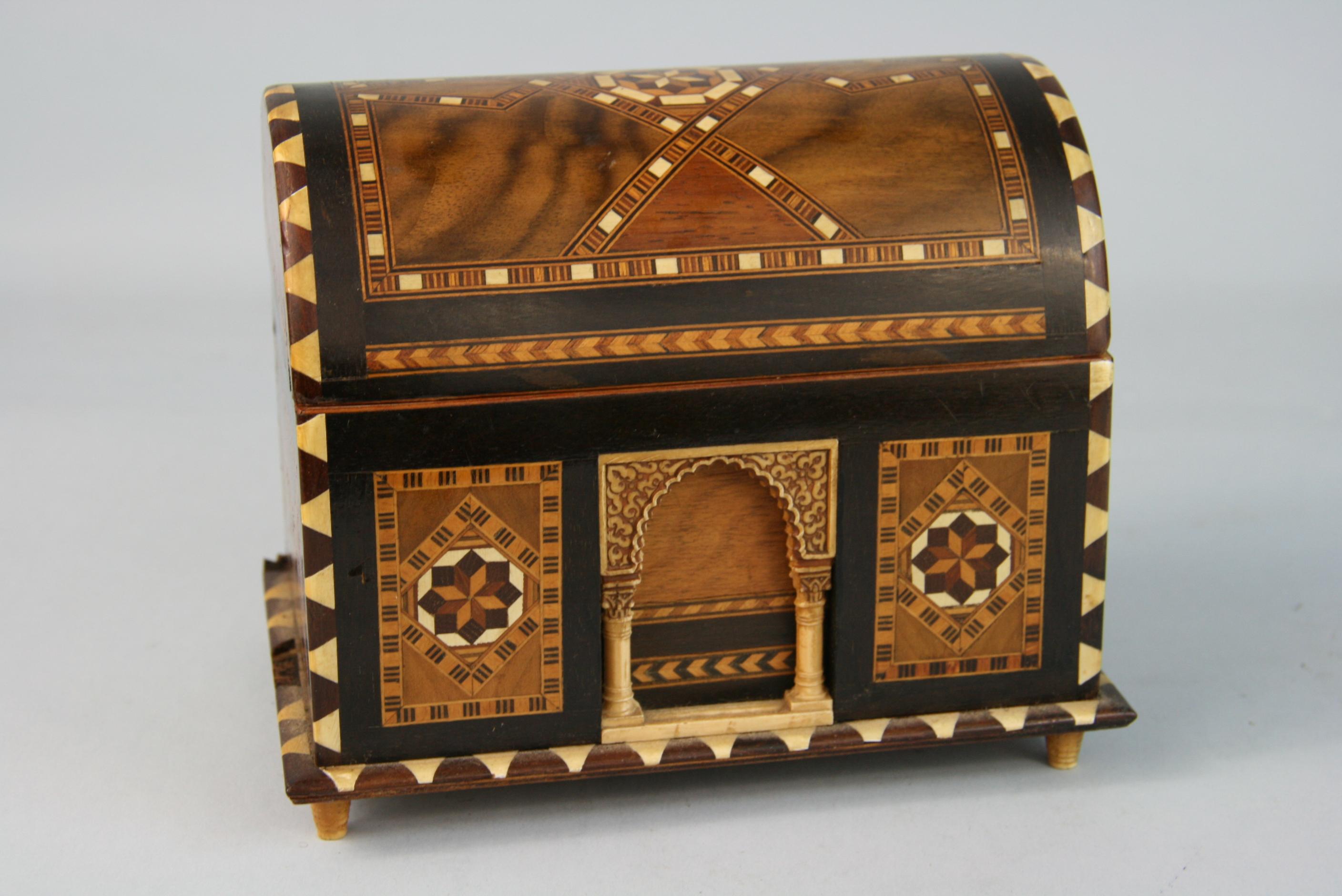 3-657 Intricate detailed wood inlaid box with column entrance.