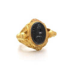 Archaeological Revival High Carat Gold Ring, Onyx Intaglio and Lion Head