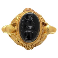 Archaeological Revival High Carat Gold Ring, Onyx Intaglio and Lion Head