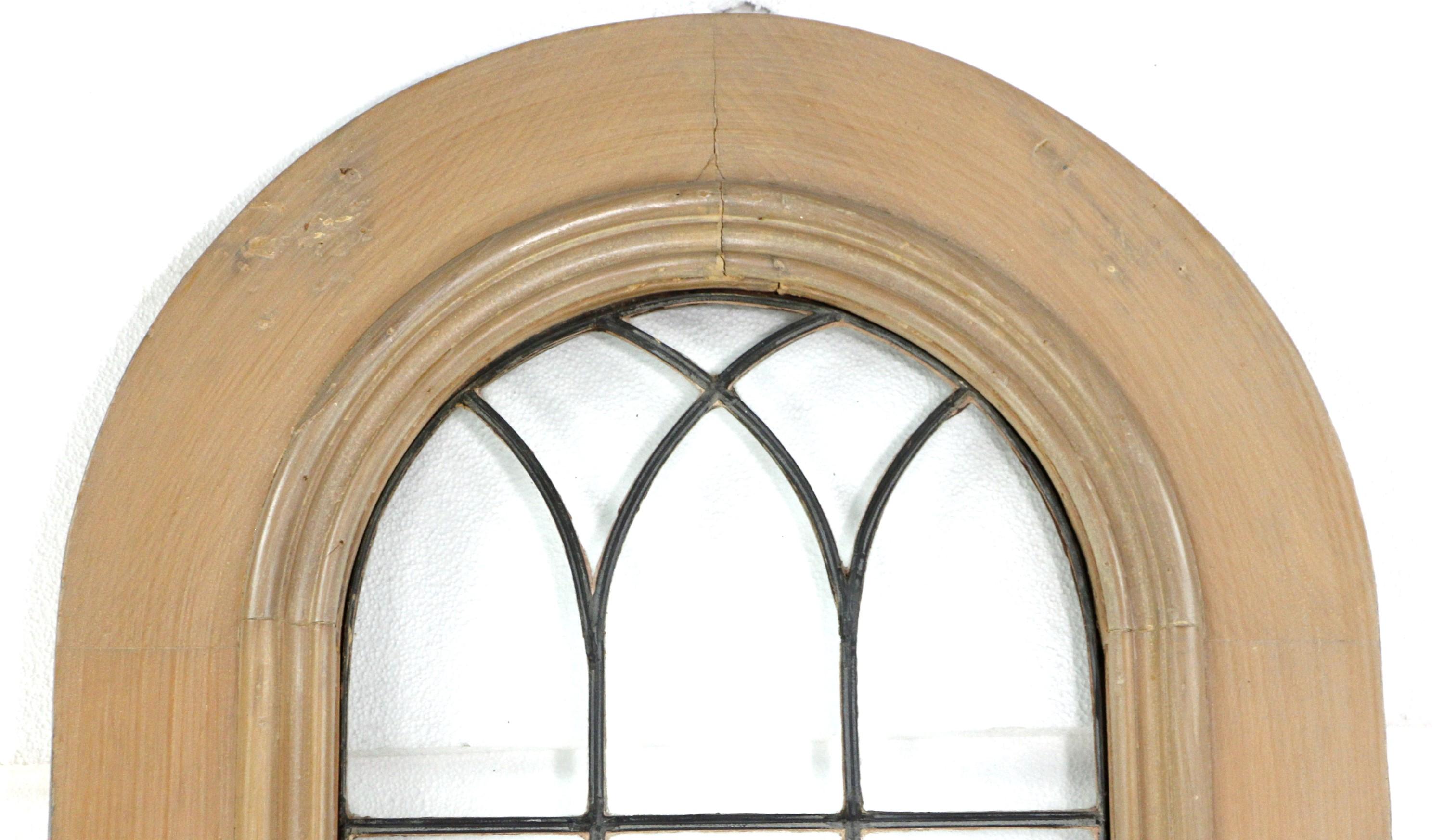 Early 20th Century American arch top door in a light tone. Total of 21 leaded glass panels with the upper ones following the arch of the door top. Typical chips and scratches as to be expected. Please see images. Please note, this item is located in