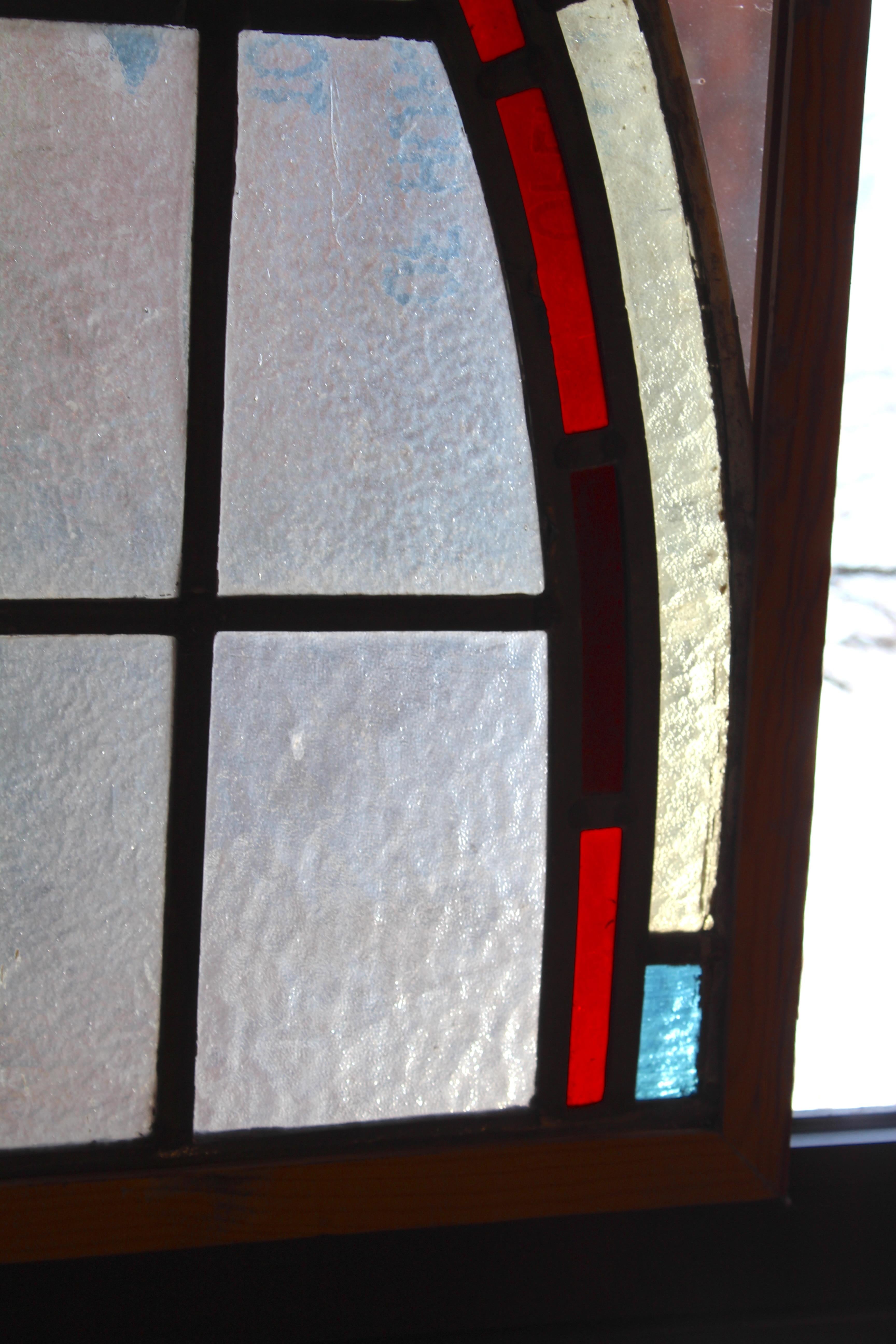 Vitrail d'église arqué avec monogramme 66