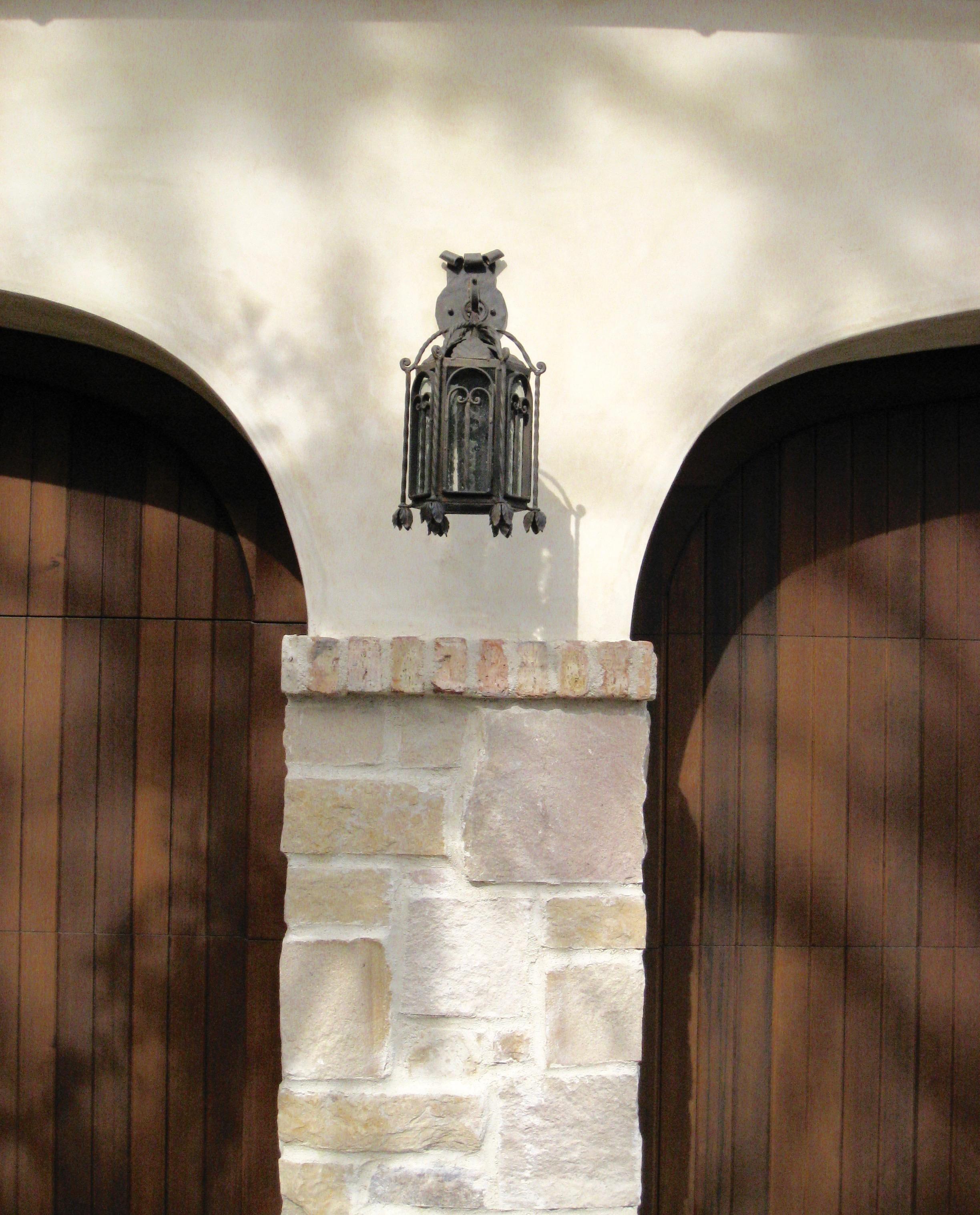 American Arched Door Forged Iron Exterior Lantern on Bracket For Sale