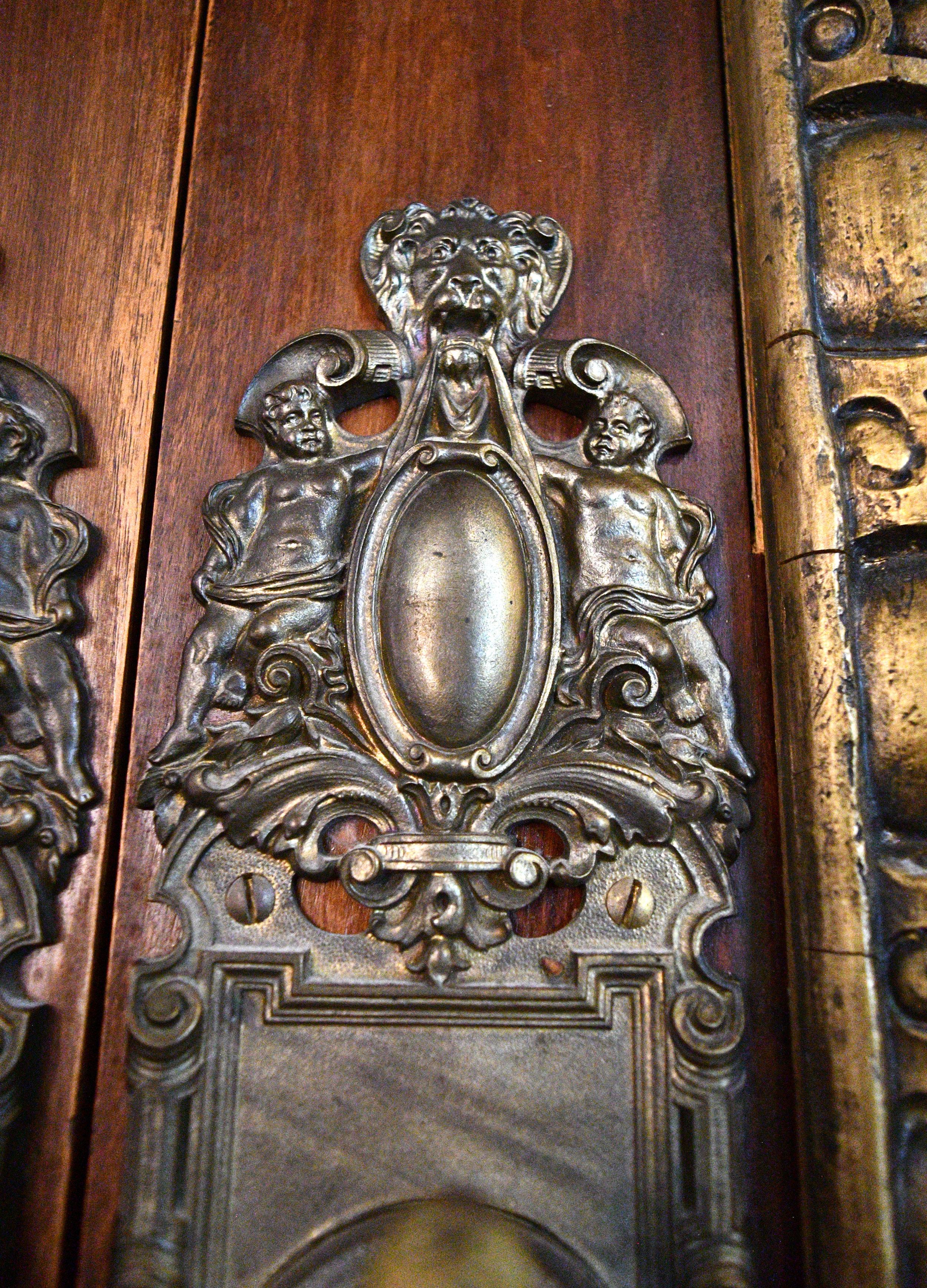 Arched Double Doors with Plaster Ornamentation  1