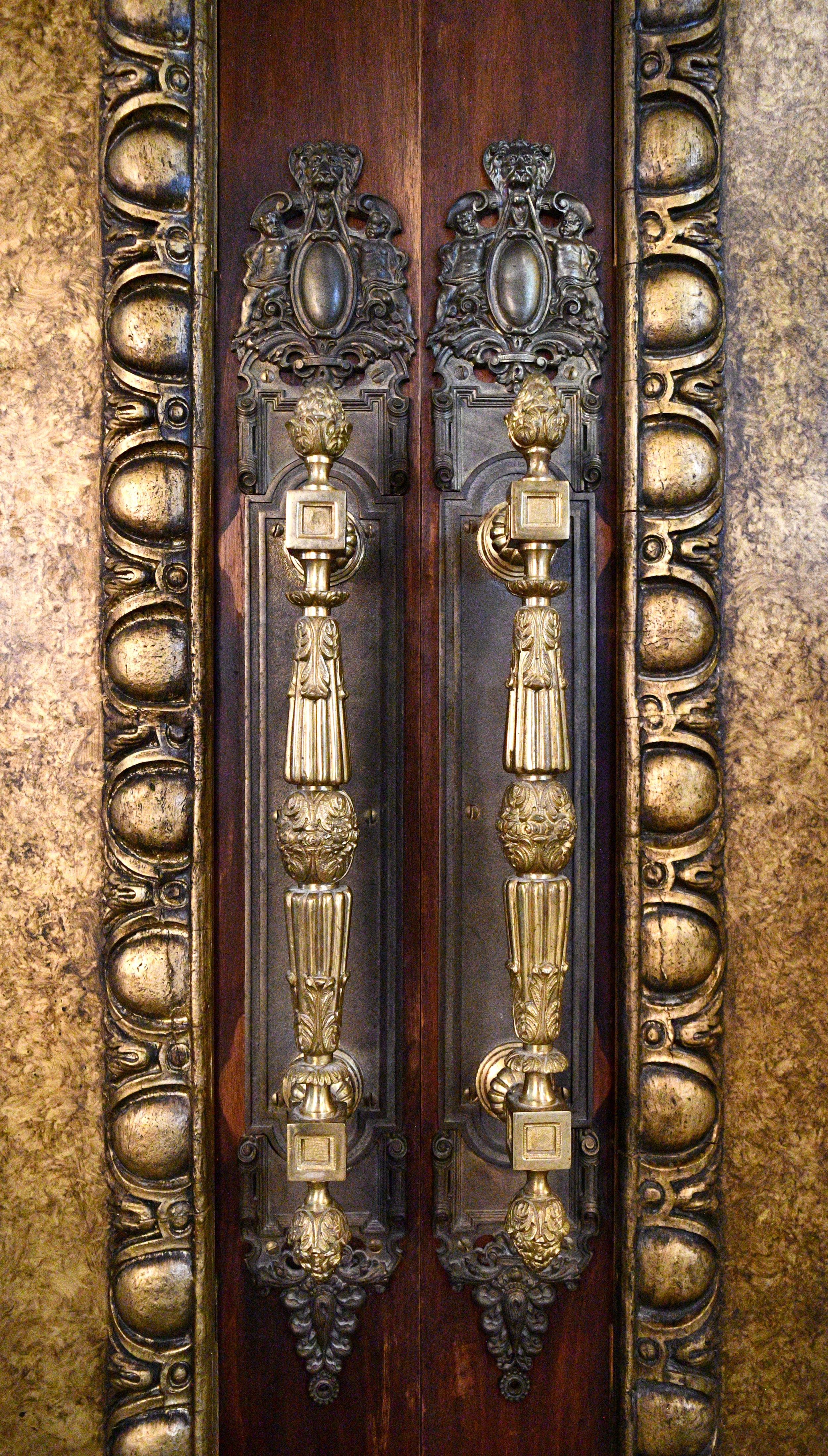 Arched Double Doors with Plaster Ornamentation  2