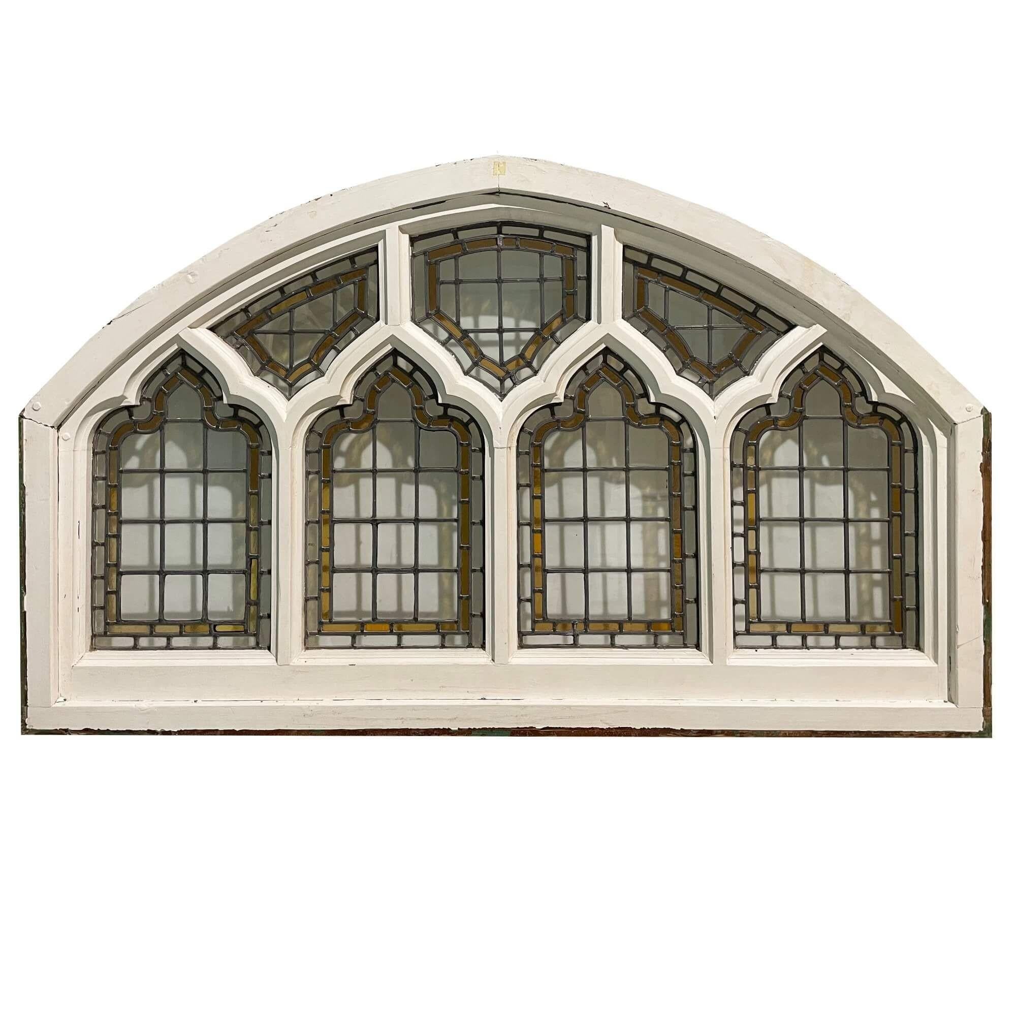 A leaded arched ecclesiastical style window dating from 1890. This arched masterpiece was sourced from a private house in Brighton, and previous to this it once took pride of place in a chapel. The window is made from softwood with a painted pine