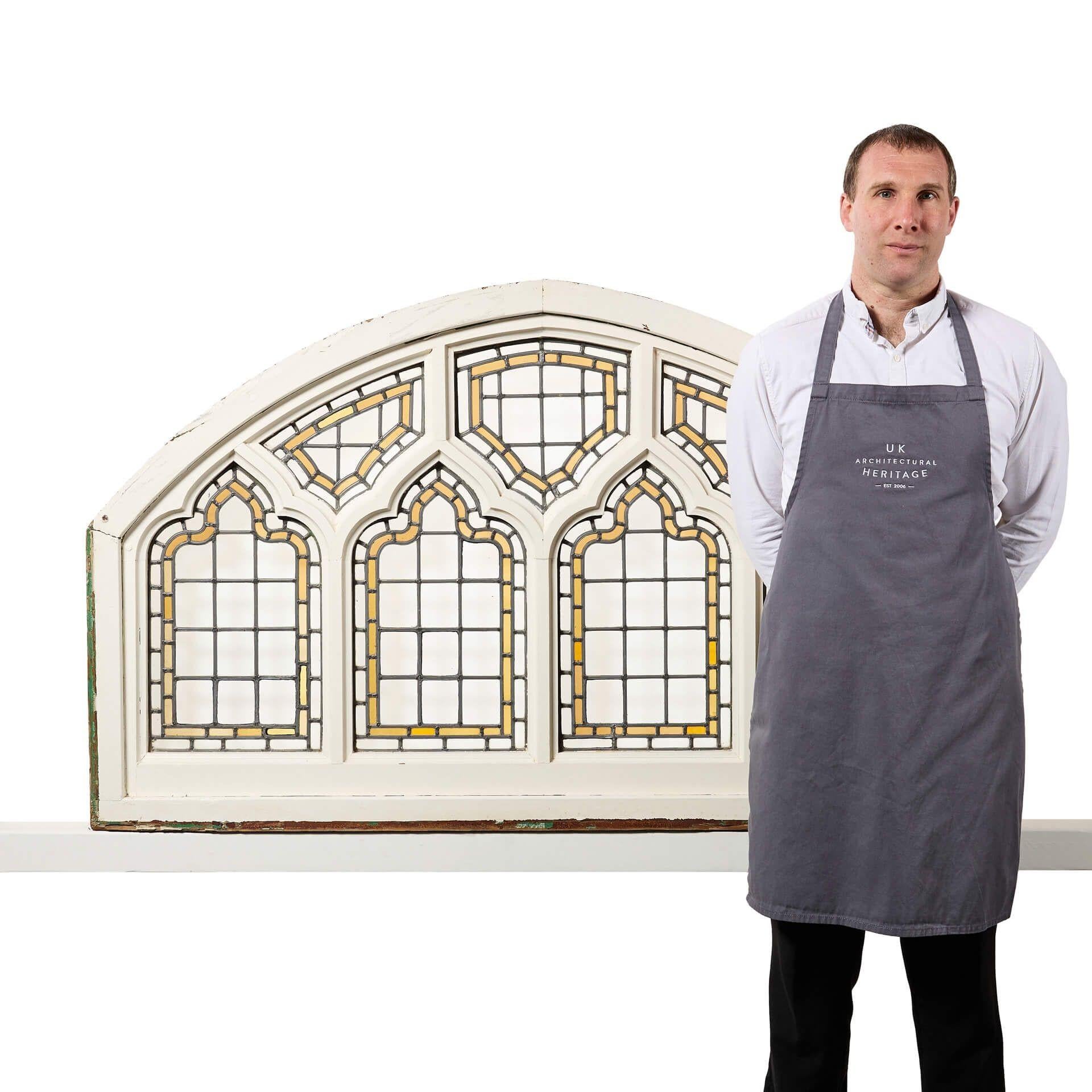 A leaded arched ecclesiastical style window dating from 1890. This arched masterpiece was sourced from a private house in Brighton, and previous to this it once took pride of place in a chapel. The window is made from softwood with a painted pine