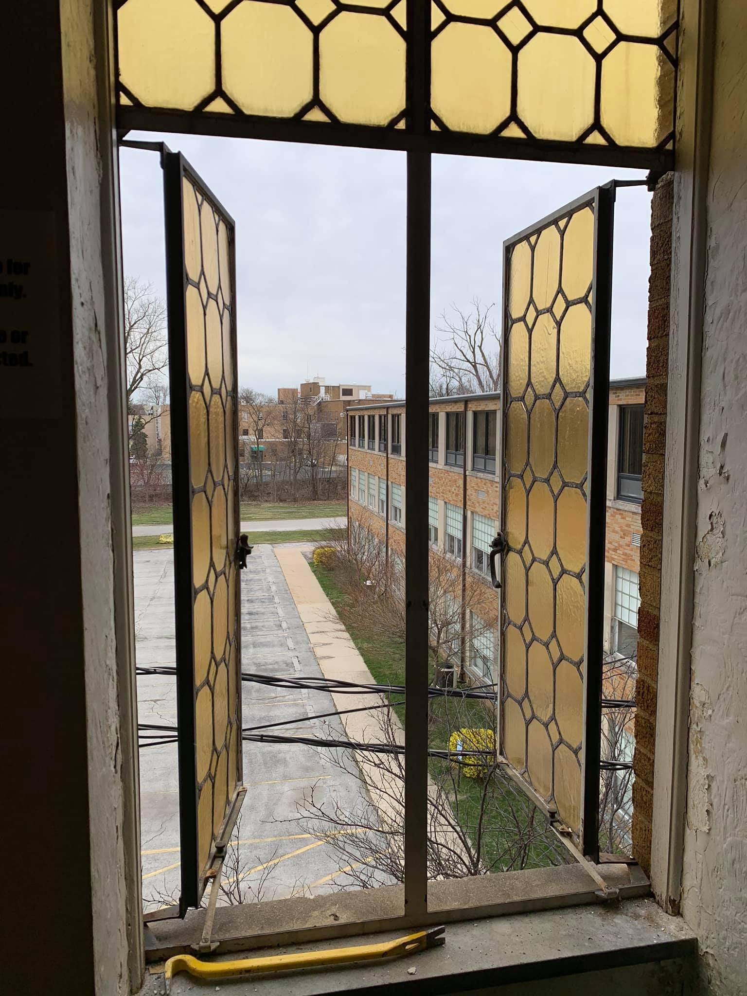 Arched Iron Framed French Window with Yellow Glass For Sale 7