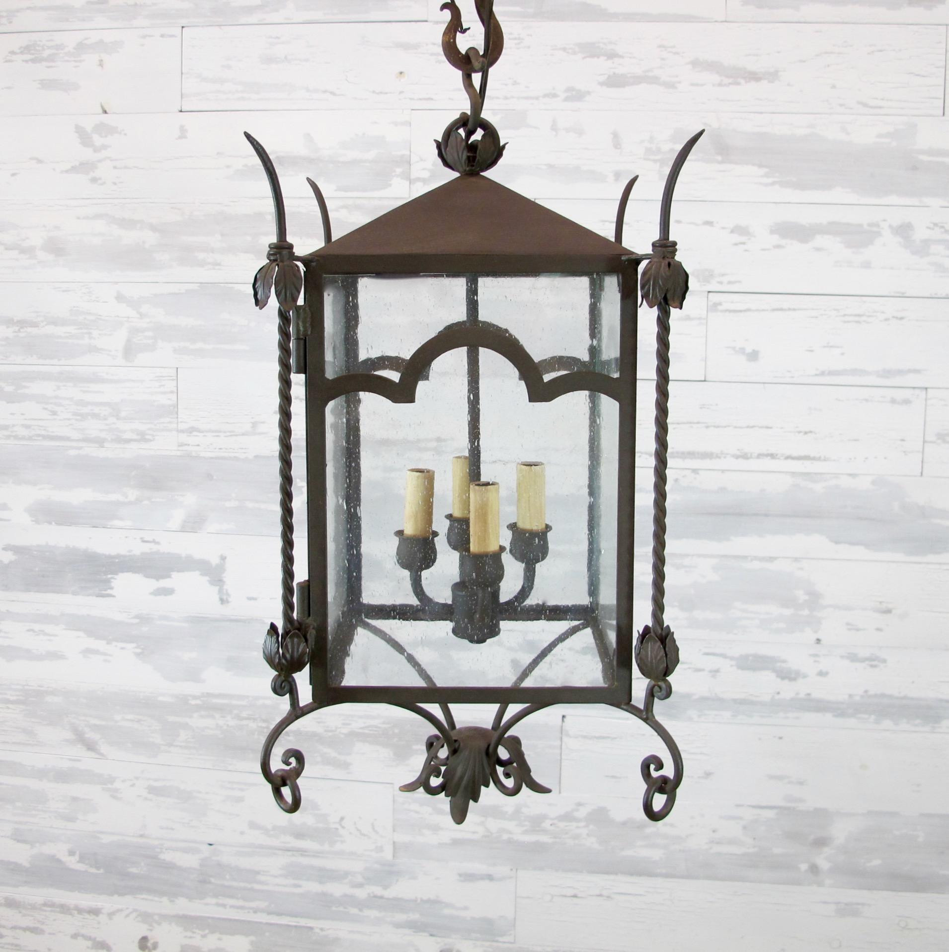 Part of the chandelier product line, this is our Lori lantern, small. This fixture can be used for Interior or exterior use and is UL listed. 3' chain included. Four candelabra base bulbs up to 60 watts/socket. Also available in small size. This
