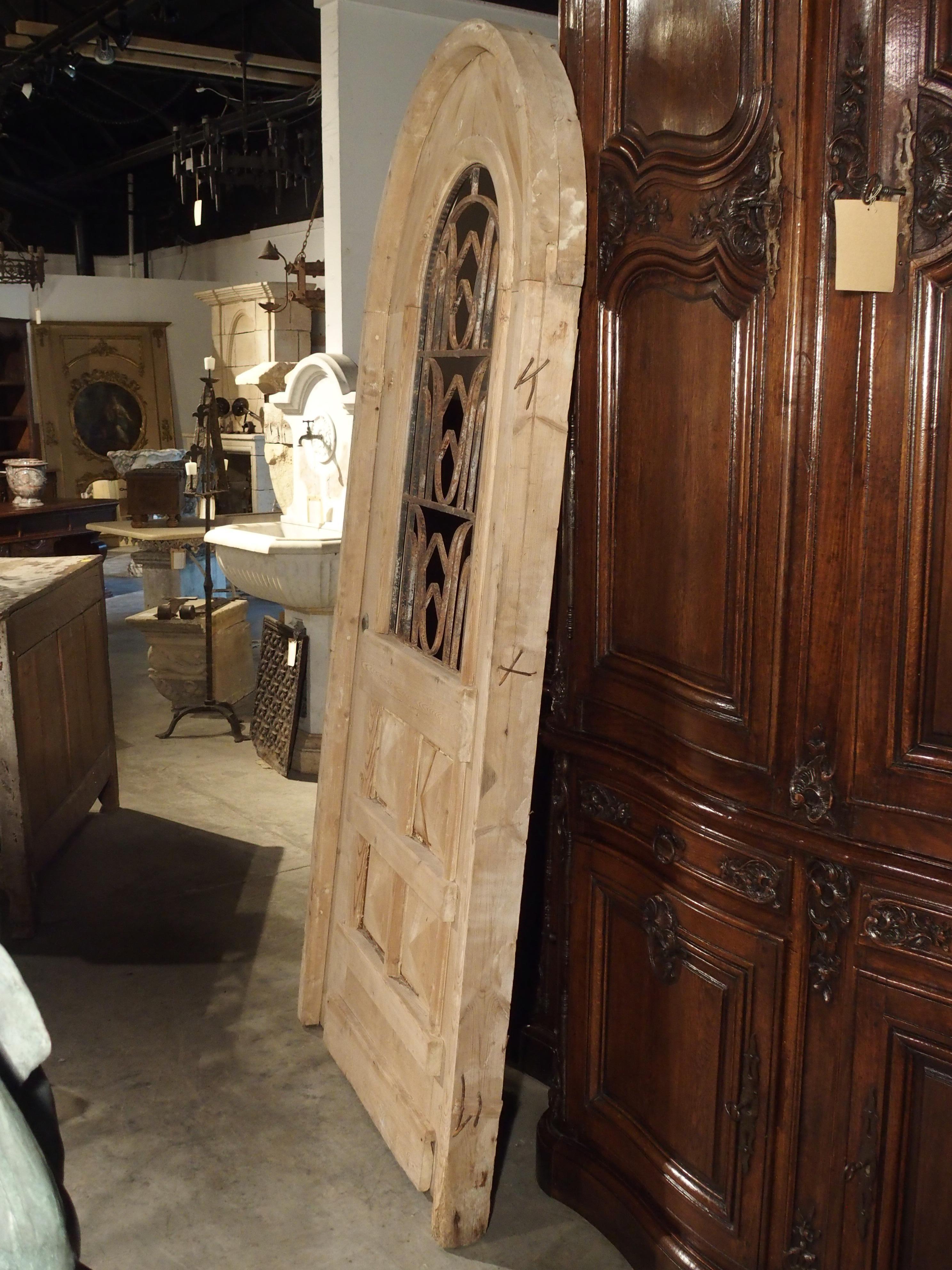 Dutch Arched Stripped Pine and Iron Entry Door from the Netherlands