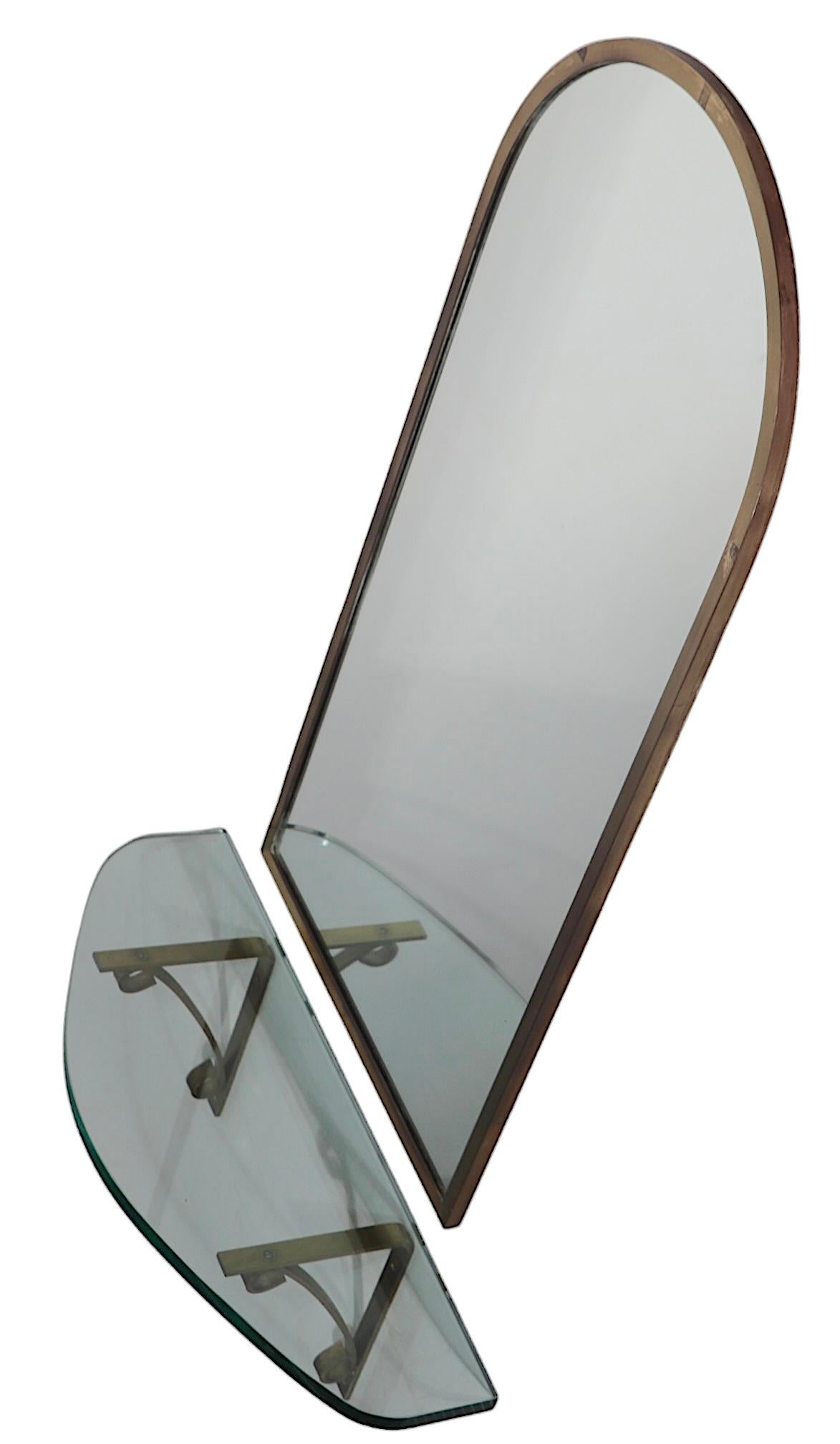 Arched Top Brass Framed Mirror over Wall Mount  Glass Shelf with Brass Supports For Sale 9