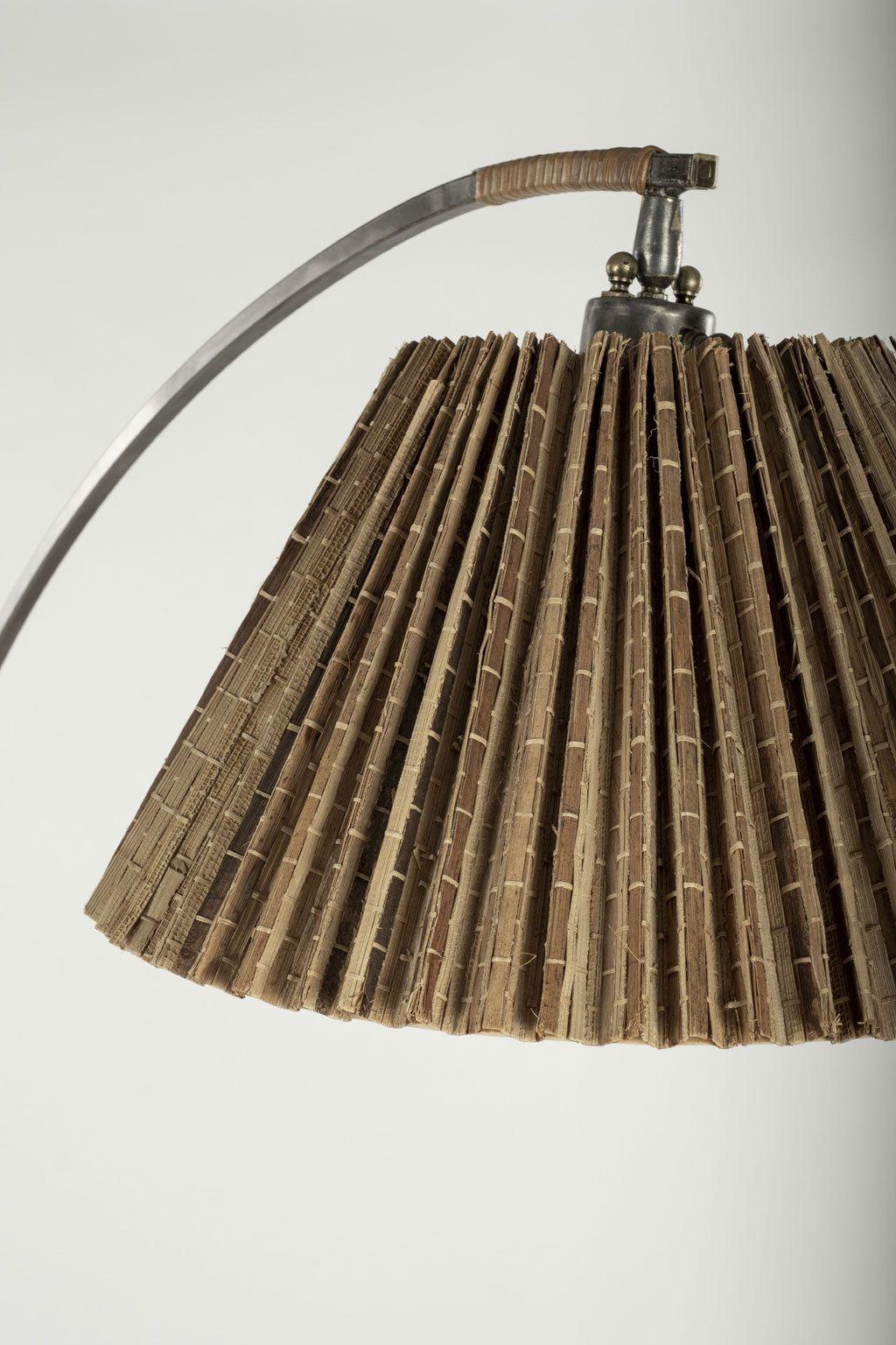 Arched vintage steel floor lamp with charming vintage pleated raffia-like natural fiber lampshade. Newly wired for use within the USA.
