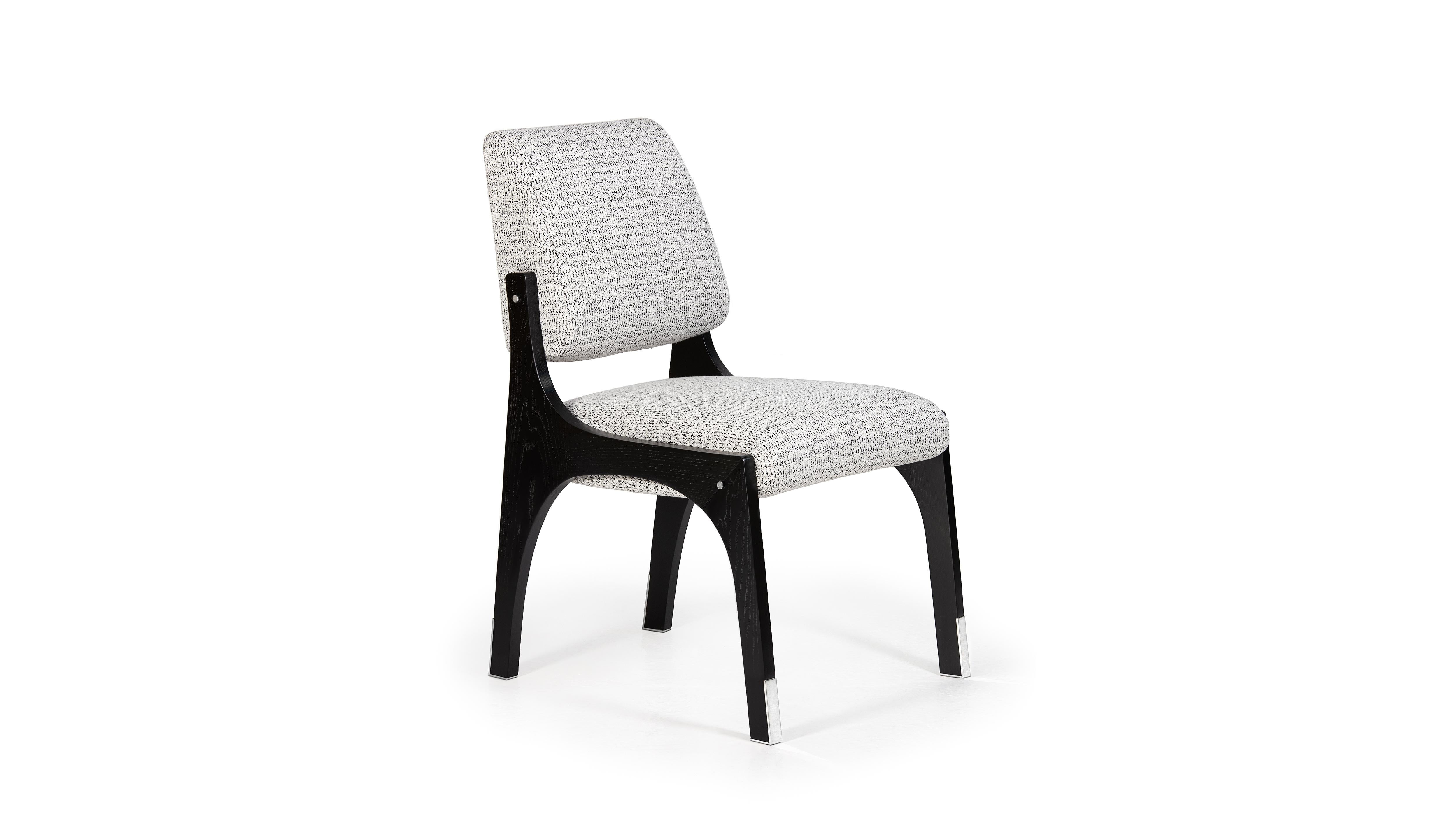 Arches Dining Chair II by InsidherLand
Dimensions: D 67 x W 53 x H 89 cm.
Materials: Black lacquered wooden frame, stainless steel, fabric InsidherLand Fusion ref. 992.
10 kg.
Available in different fabrics.

Since the Renaissance, many attempts