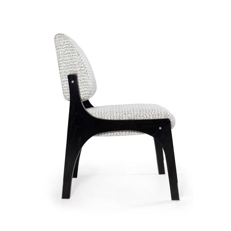 The Arches II dining chair is designed in the likeness of the architectural scale that suggests a crossing through the structures of a utopian city, organized by the principles of symmetry and ideal forms.
The Arches II dining chair is a redesign of