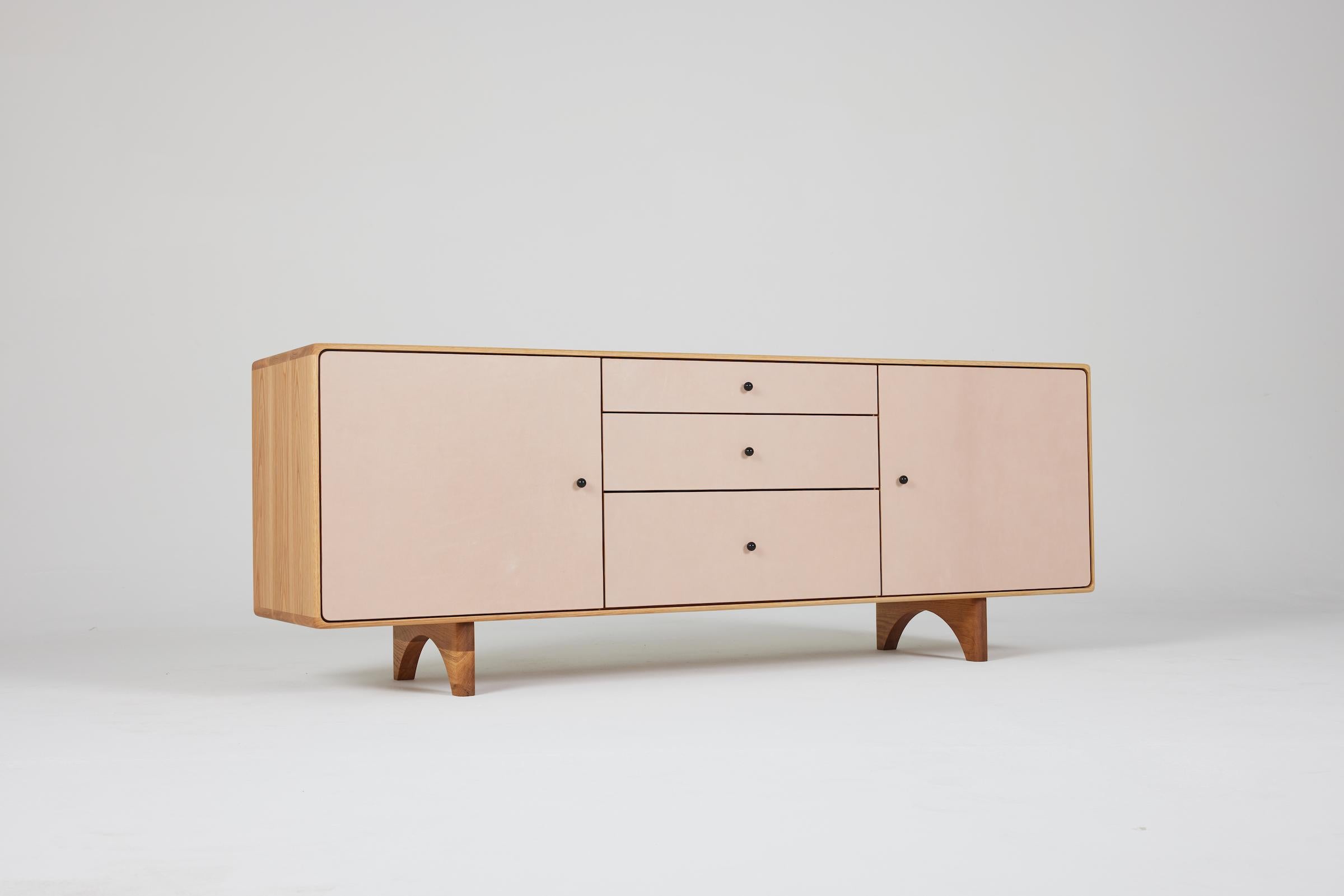 A flagship case good that features radius and recessed faces to ultimately highlight the case body. A smooth subtly rounded carcass is a minimal but timeless design effort that will be the highlight to any space. We offer the Archibald to be as