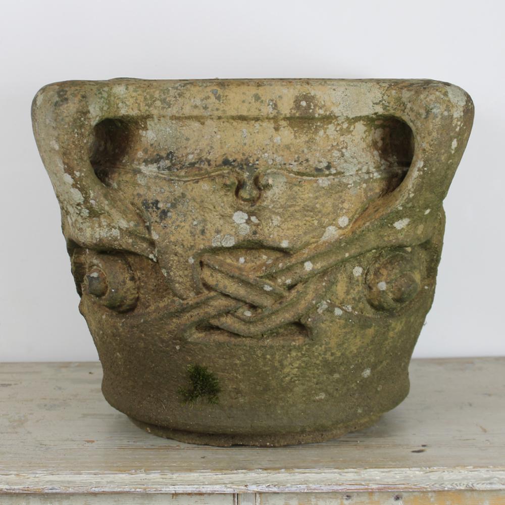 A rare and beautiful, Arts And Crafts, early 20th century, large terracotta 'Olaf' pot, designed by Archibald Knox, made by Compton potteries and retailed by Liberty. In excellent condition and beautifully weathered, incised Liberty stamp.
This